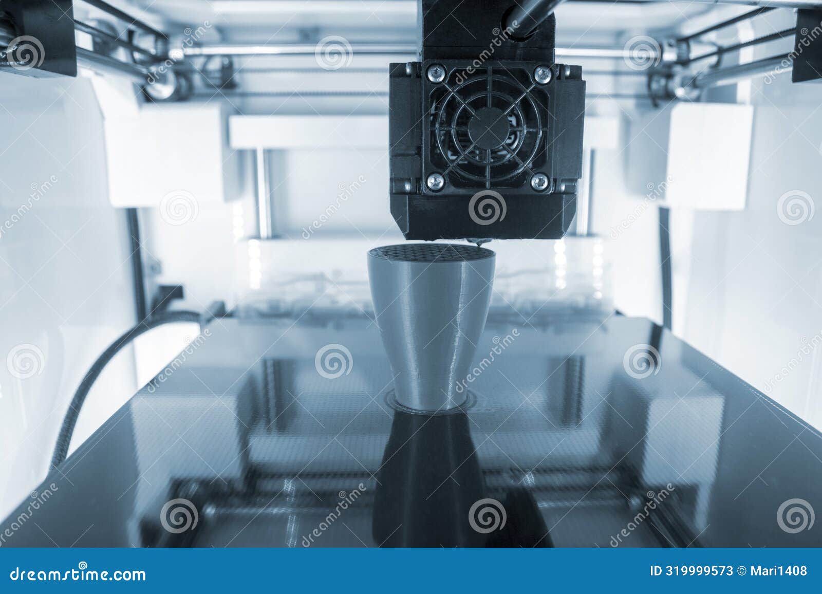 3d printer working close-up 3d printer prints a model from molten plastic
