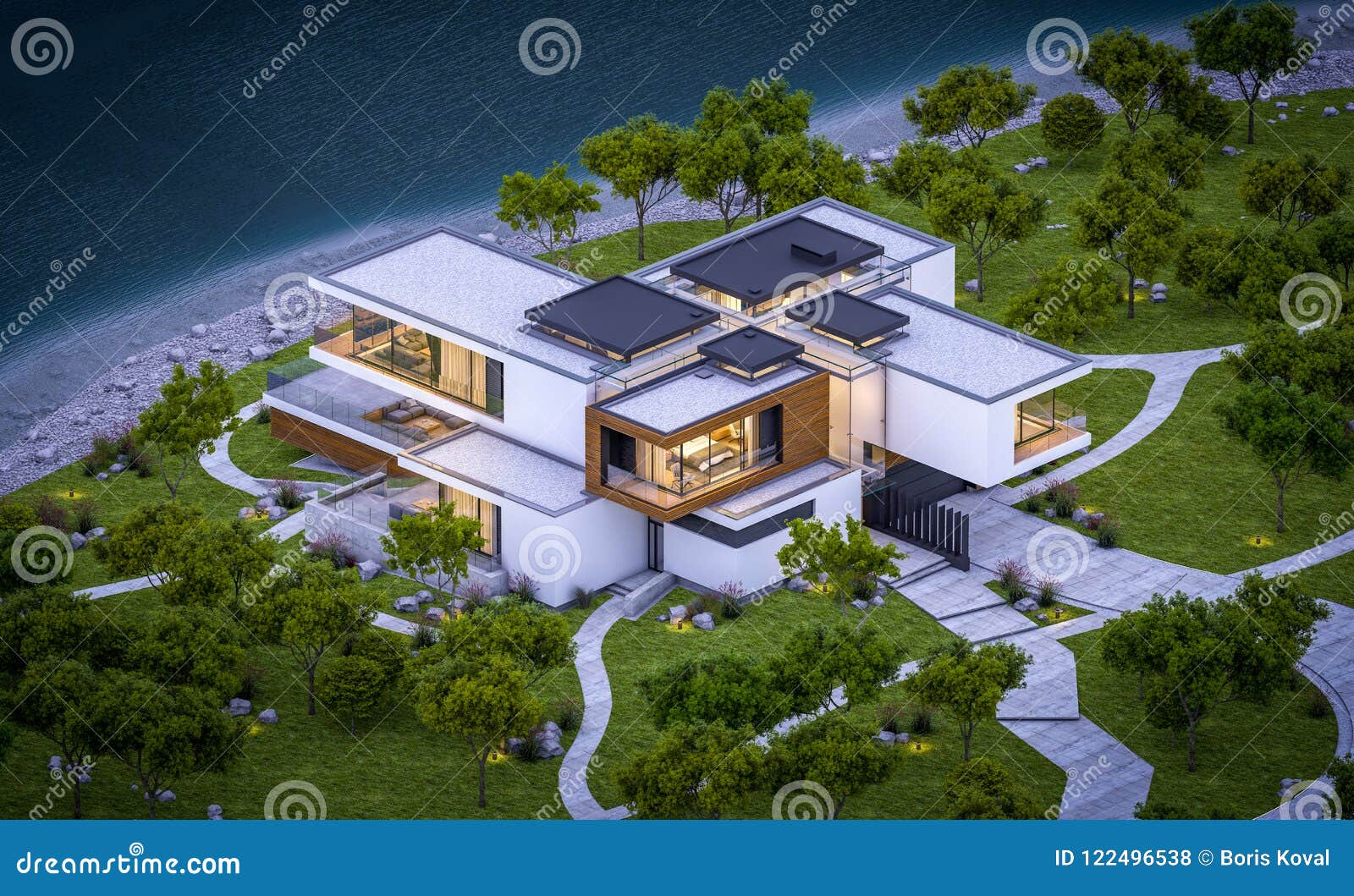 Modern House Exterior At Twilight. Luxury Villa With Garage. Stock