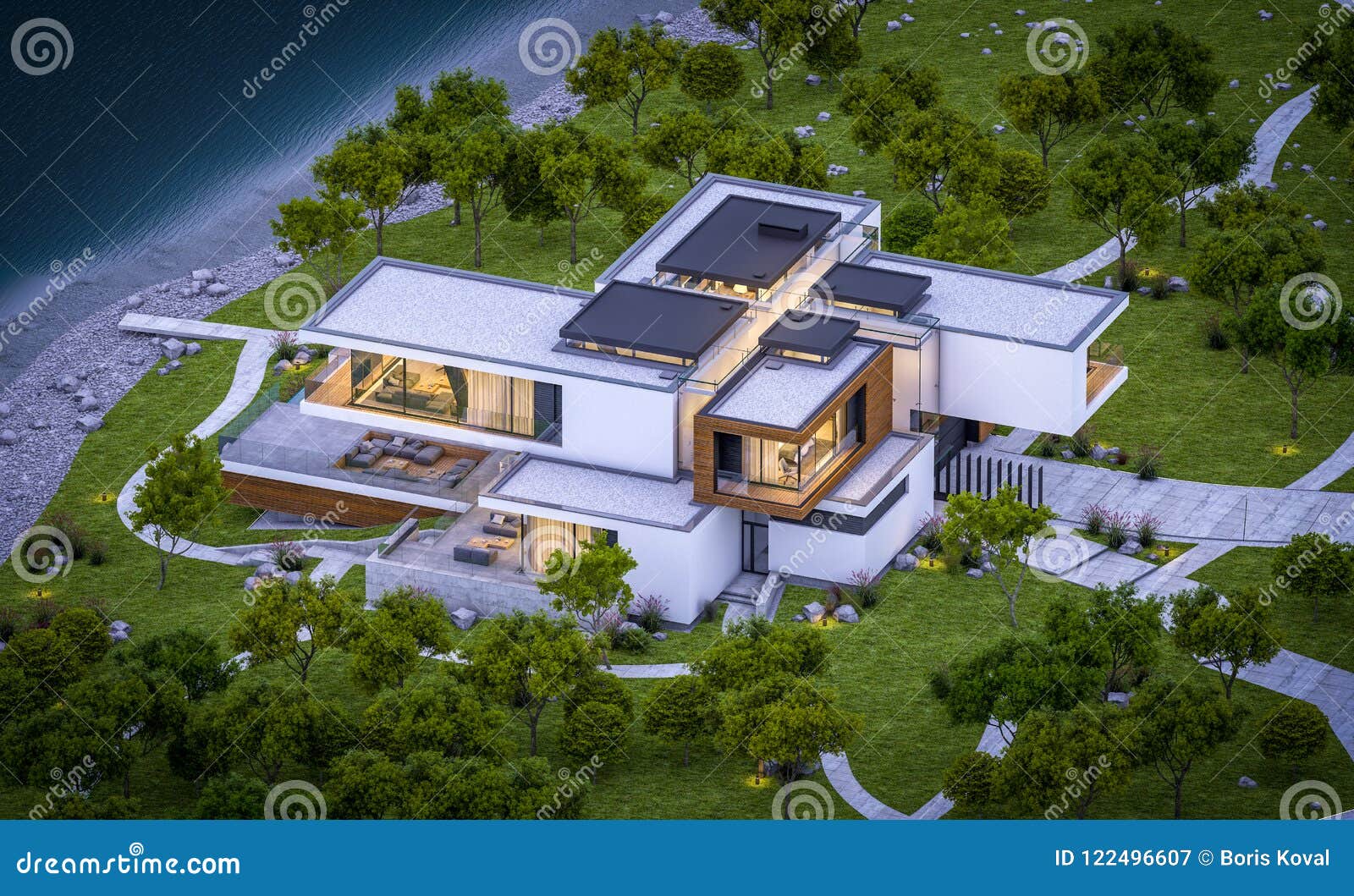 Modern House Exterior At Twilight. Luxury Villa With Garage. Stock