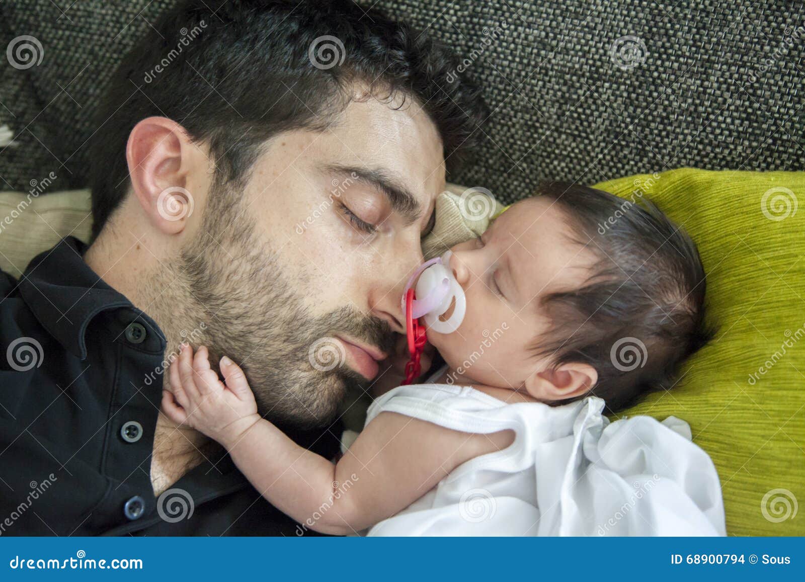 Dad and Daughter Having a Nap Together. Stock Photo Image of innocent