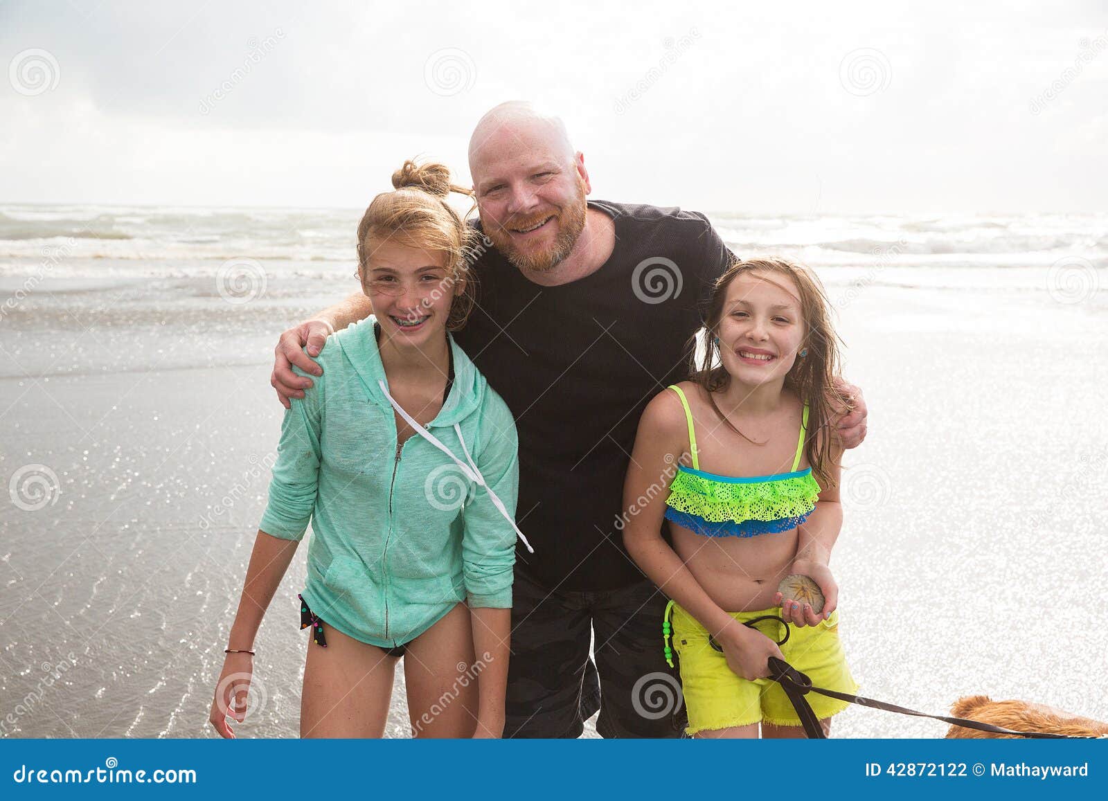Dad and Daughters at the Beach Stock Photo - Image of getaway, father