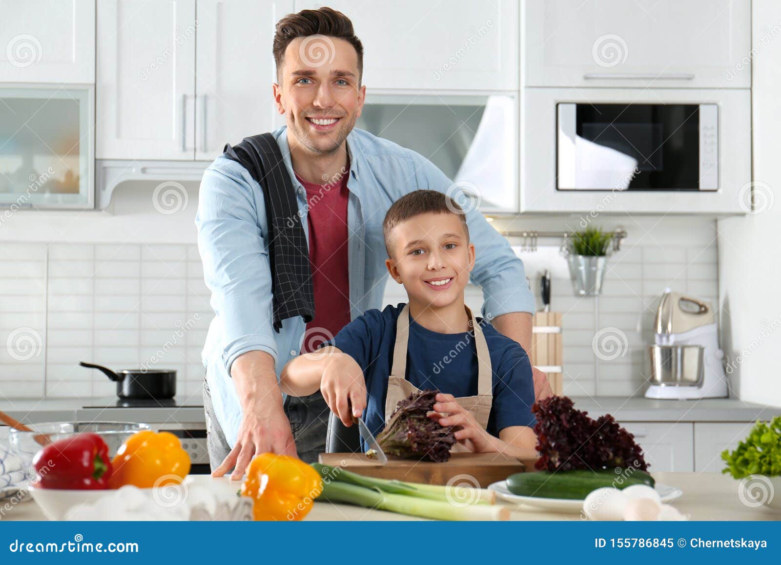 Dad and Son Cooking Together Stock Image Image of childhood, family