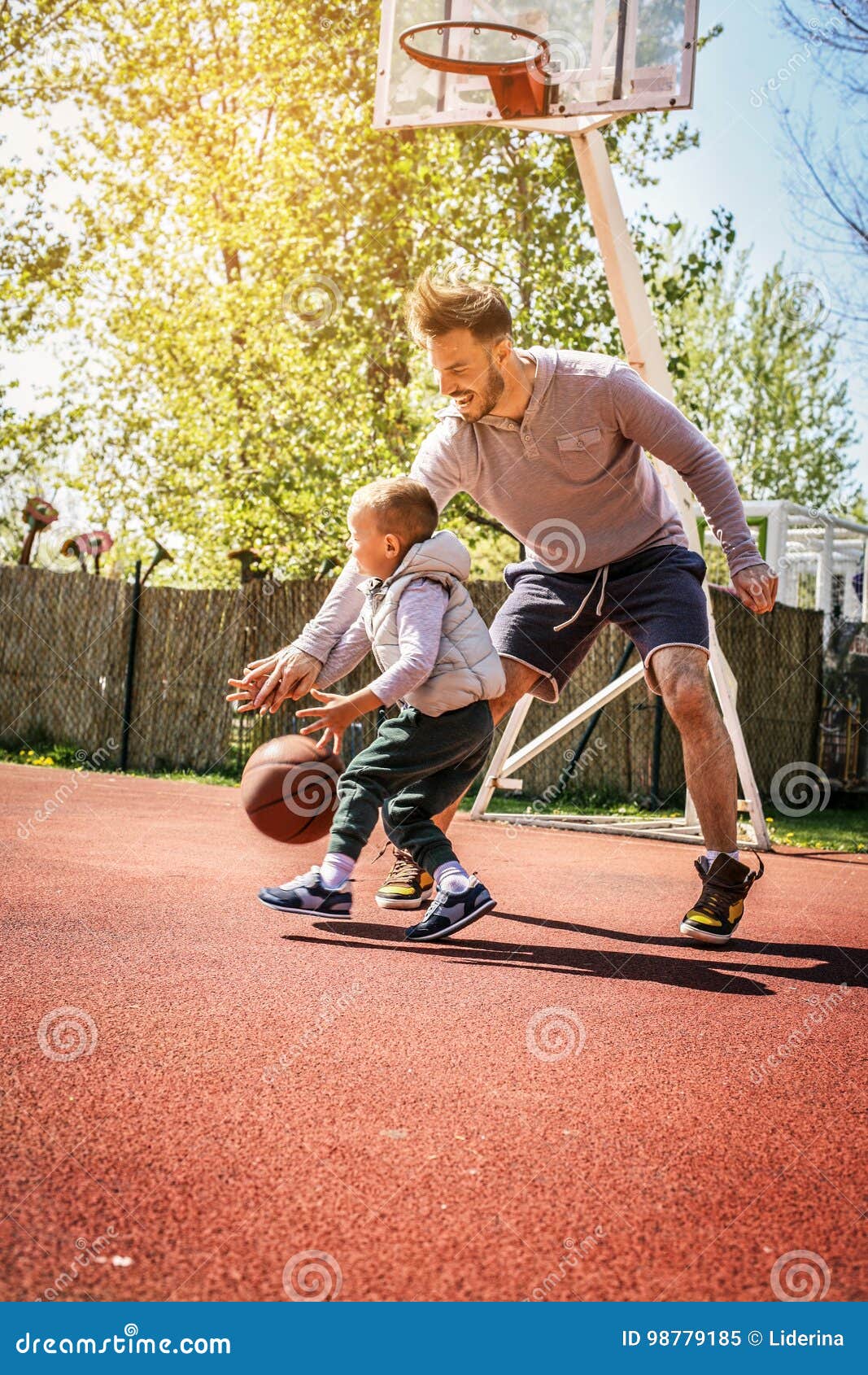 Dad and son. stock image. Image of basketball, playing 98779185
