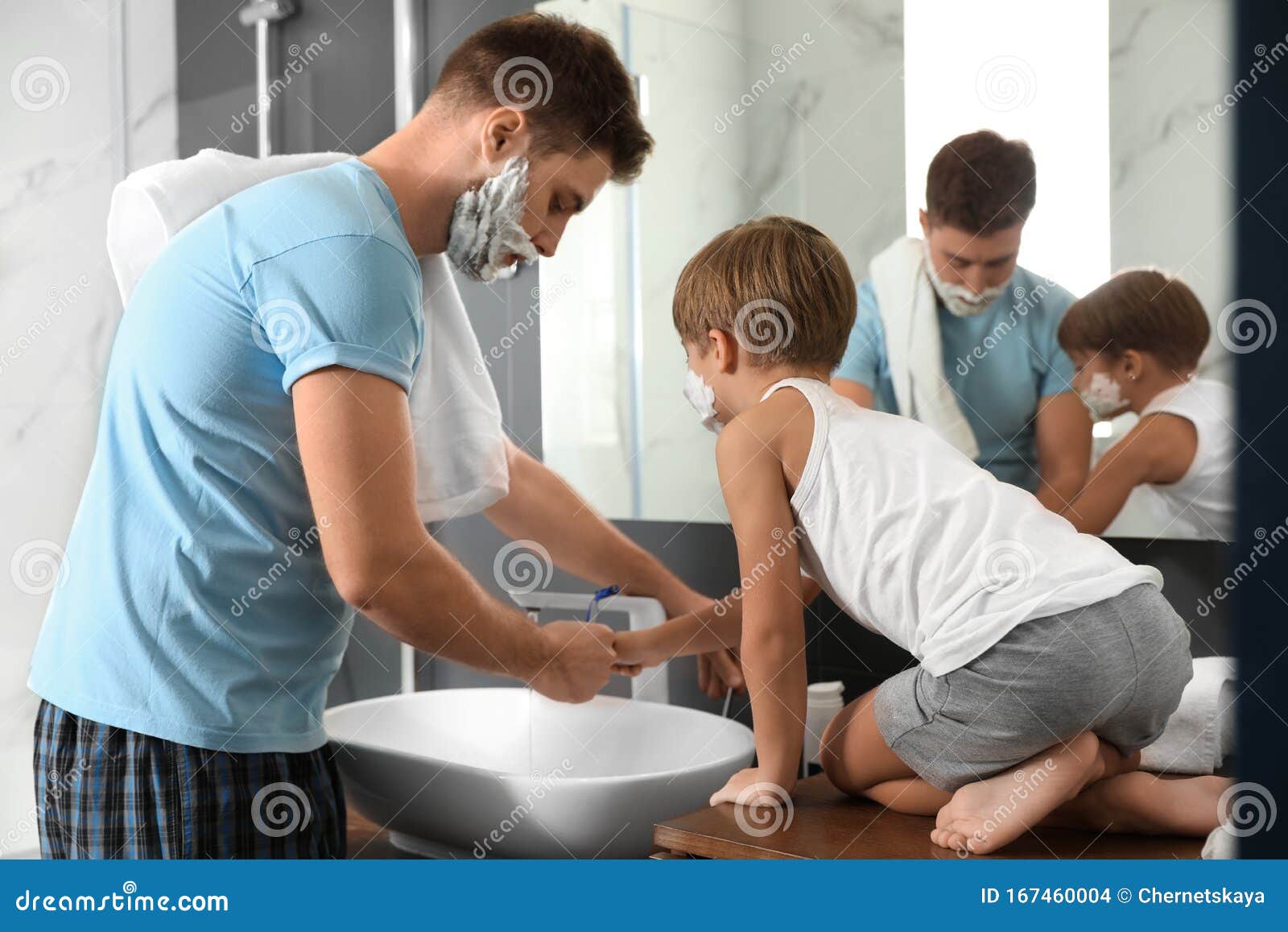 Dad and son washing razors stock photo. Image of people 167460004