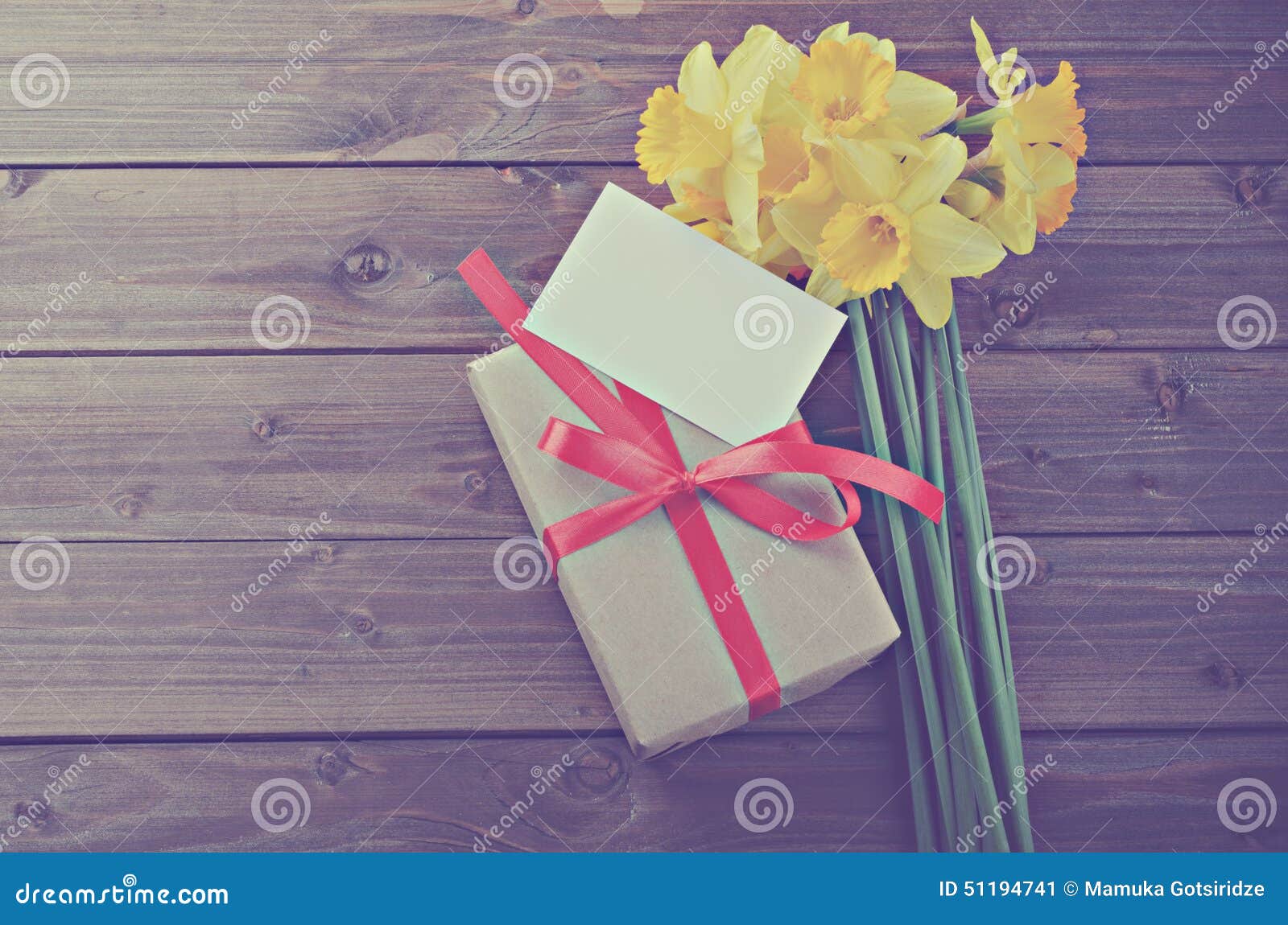 Daffodils with gift box stock image. Image of fashioned 51194741
