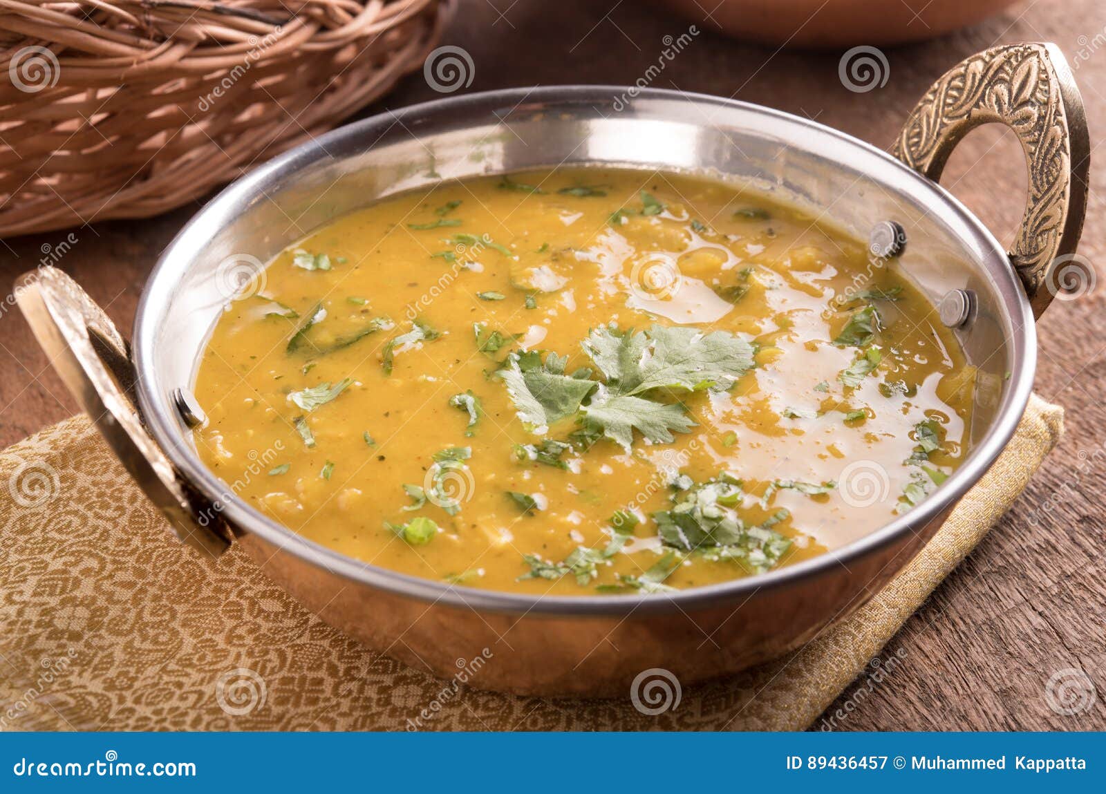 dal curry on wooden background