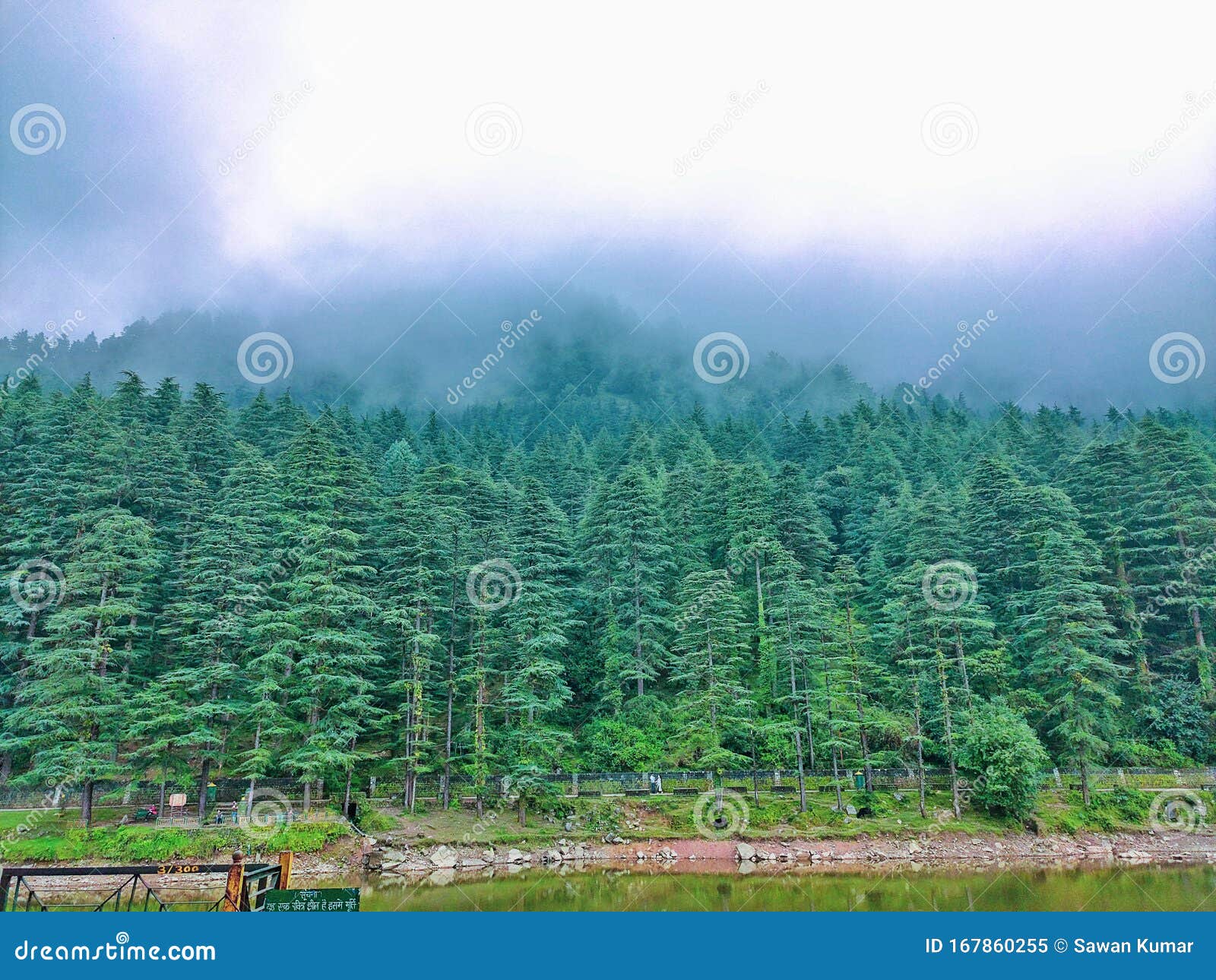 dal lake below the hills in dharmshala himachal pradesh