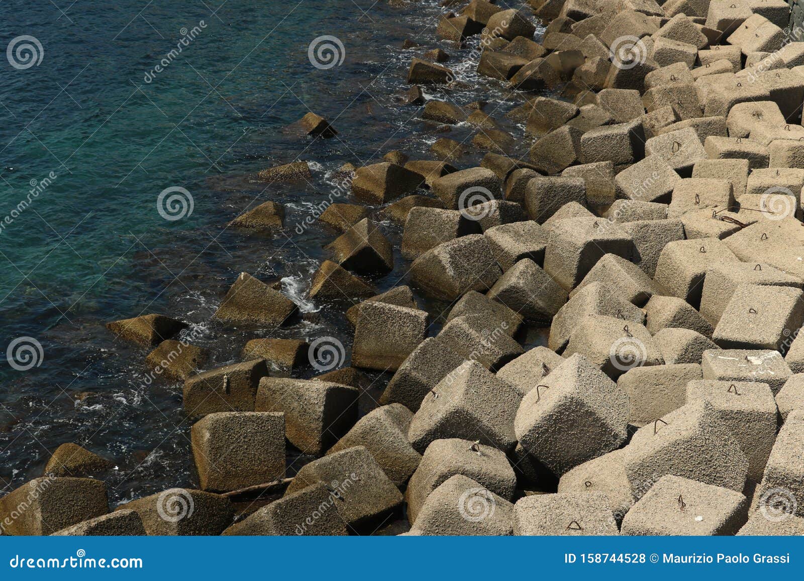 Dam on the Sea with Concrete Blocks. an Artificial Reef for the Stock