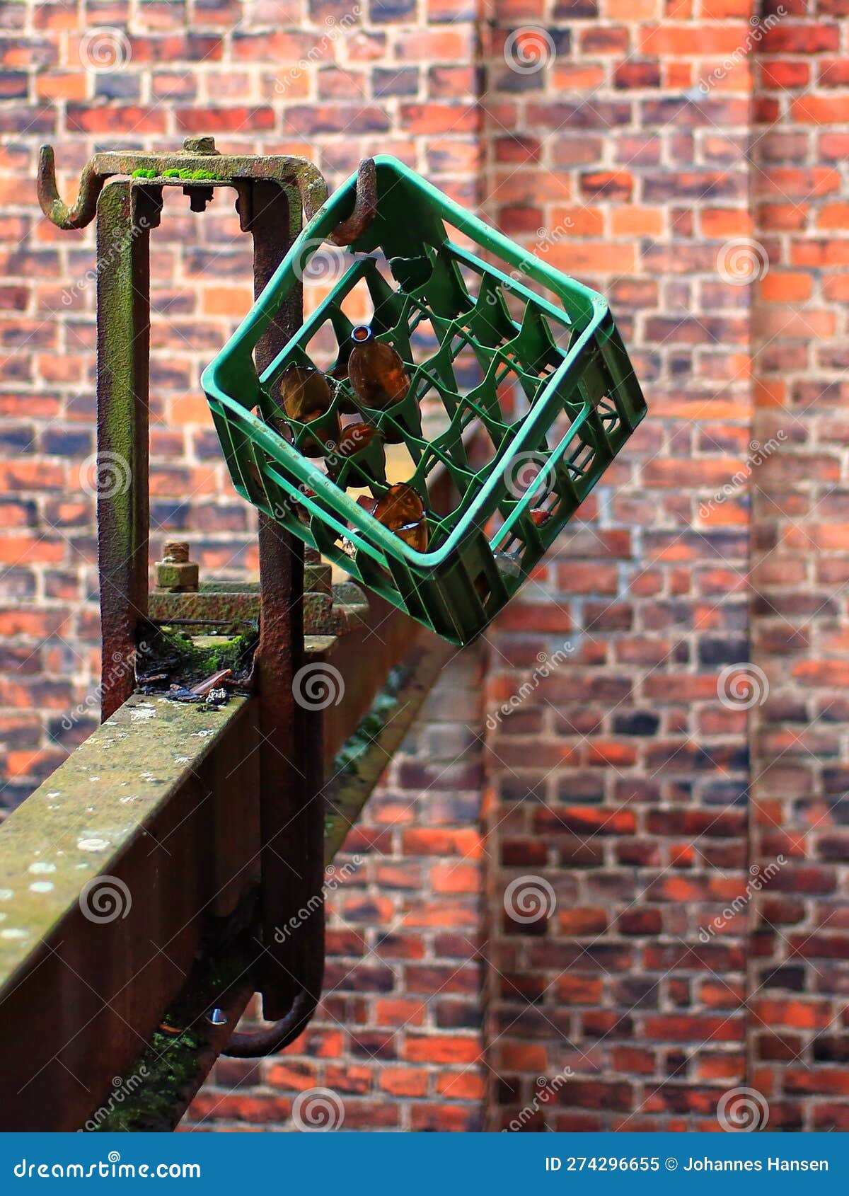 Damaged Beer Crate Ended Up on a Hook after Drinking Session Stock