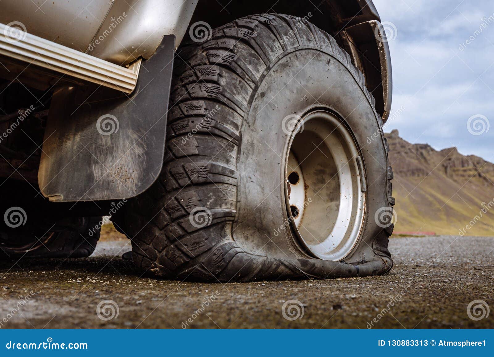Damaged Flat Offroad Tire on a Road Stock Image Image of puncture