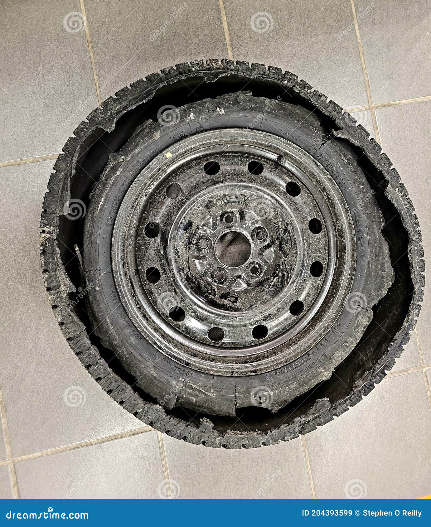 Damaged tire after blowout stock image. Image of metal 204393599