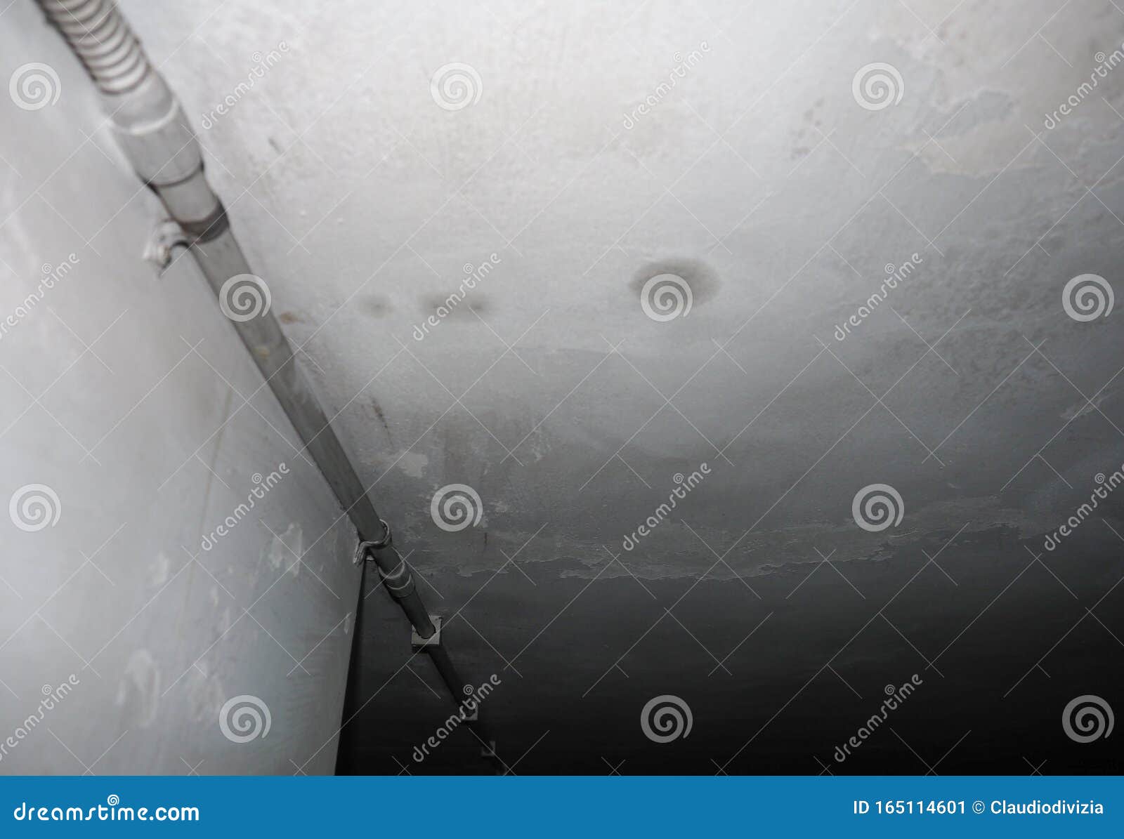Dampness Moisture on Ceiling with Drops of Water Infiltration Stock