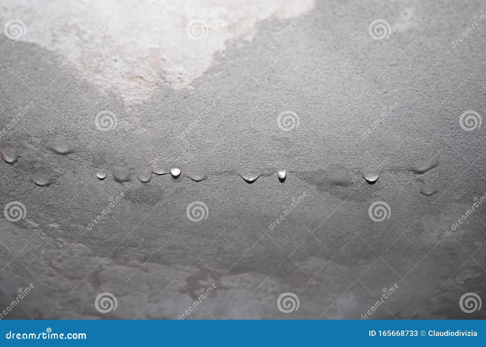 Dampness Moisture on Ceiling with Drops of Water Infiltration Stock