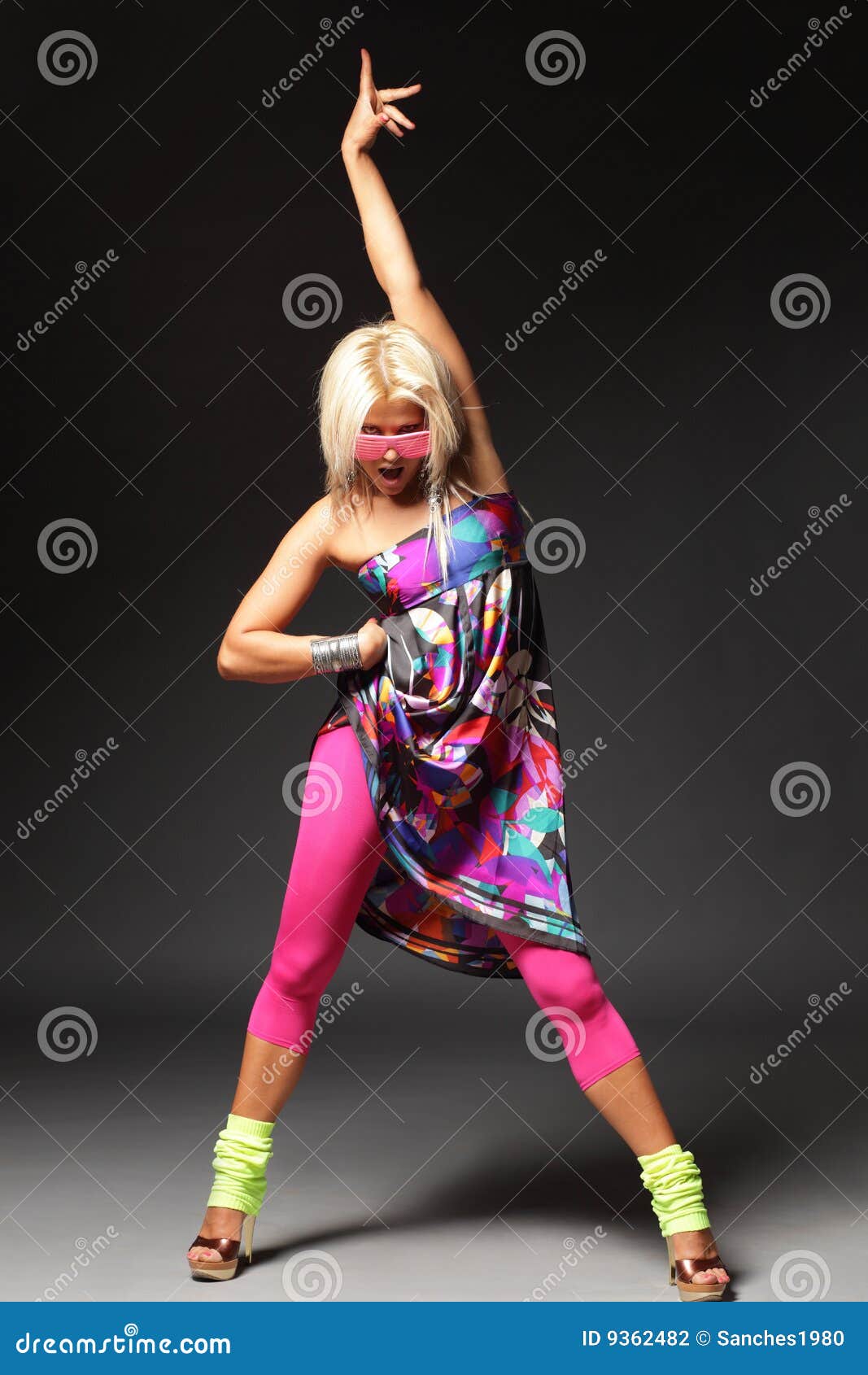 The dancer. Modern style dancer posing on studio background