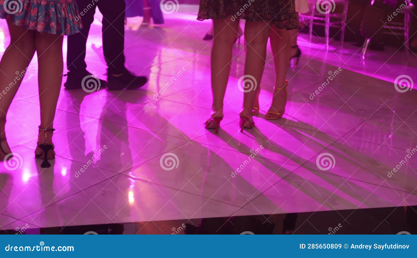 Dancing on the Dance Floor Legs of Different Women in Beautiful Dresses ...