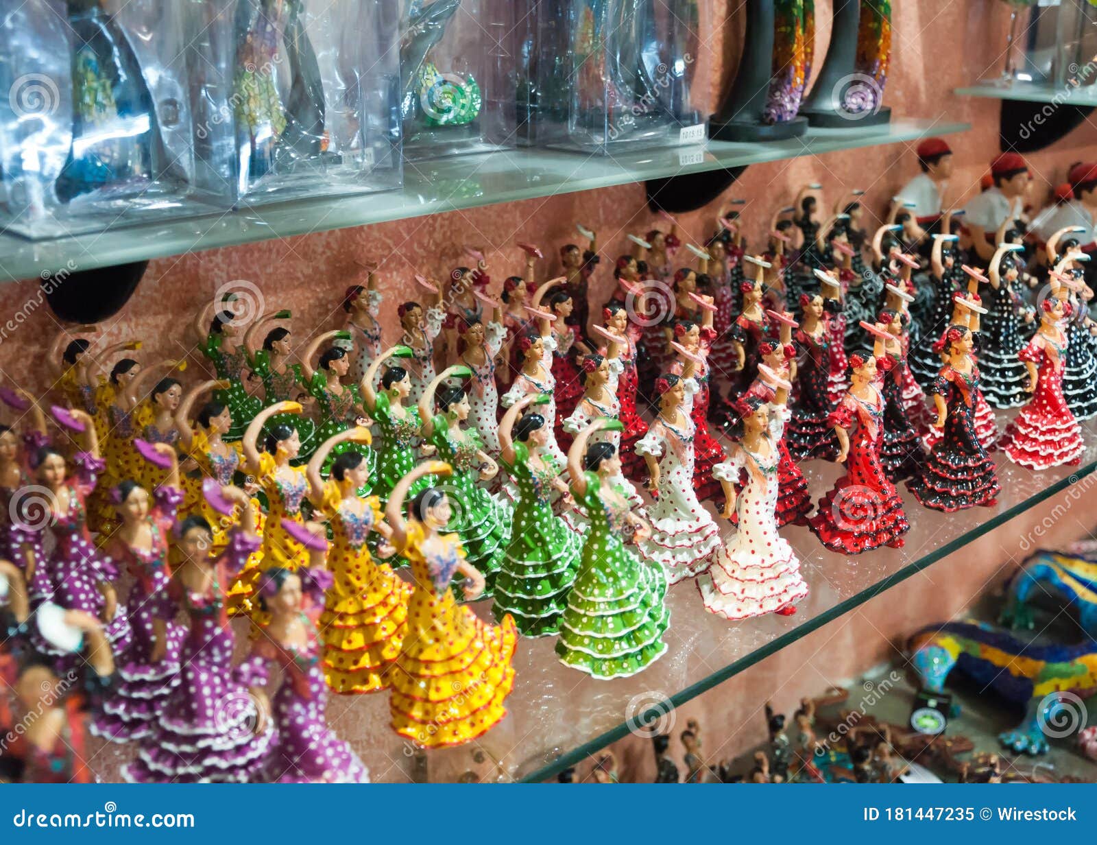 Dancing Dolls On The Glass Shelf Of The 