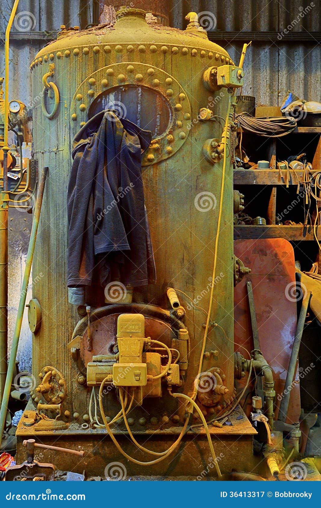 danger, old yellow industrial boiler