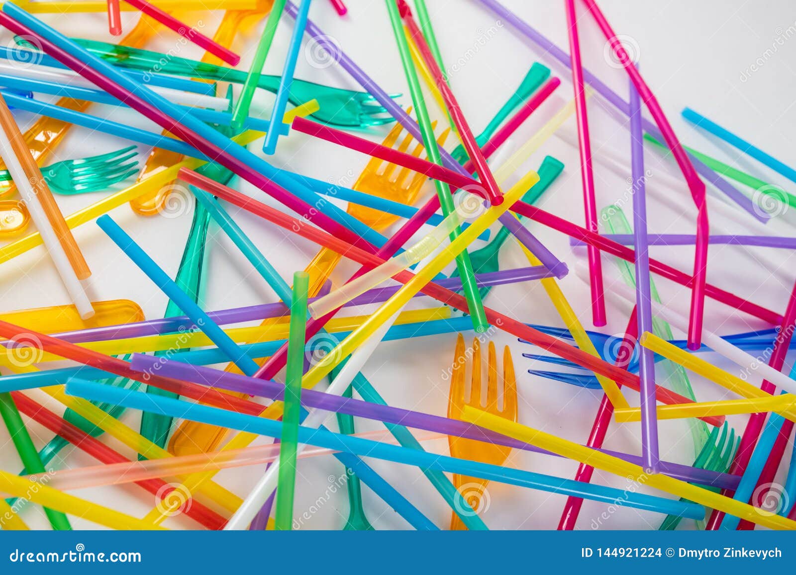 Dangerous and Harmful Bright Straws Being Thrown on the Floor Stock