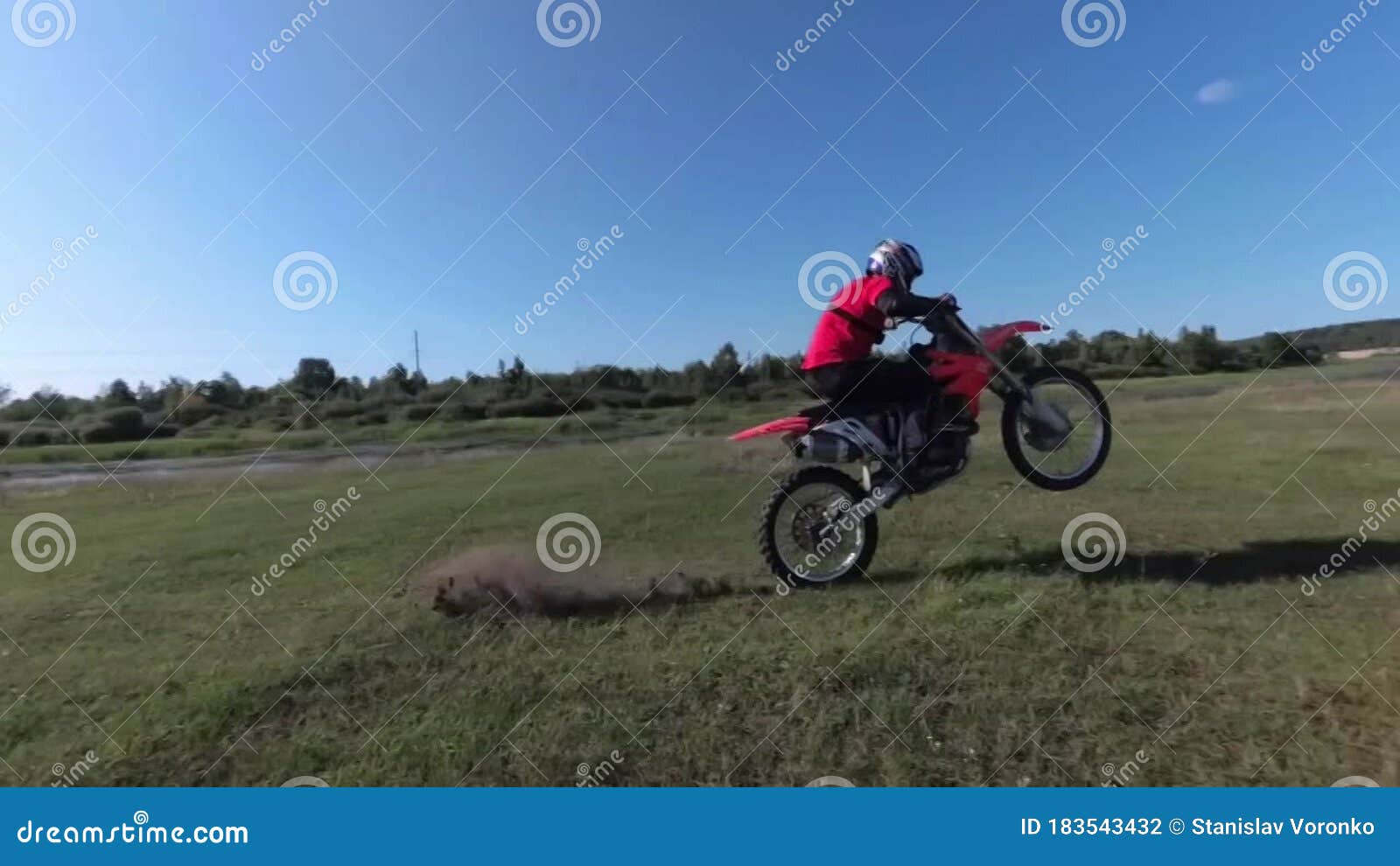 Dangerous Motorbike Riding on the Field. Stock Footage Video of