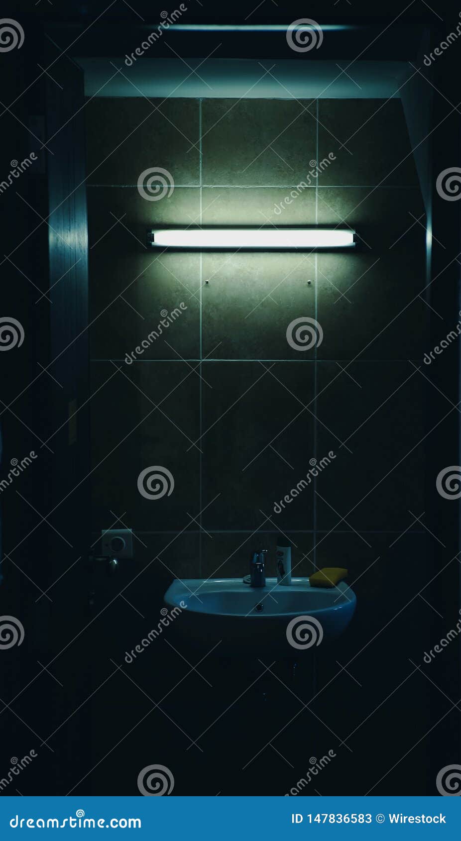 A Dark Bathroom with a Dim Light Stock Image Image of bathroom, metal 147836583