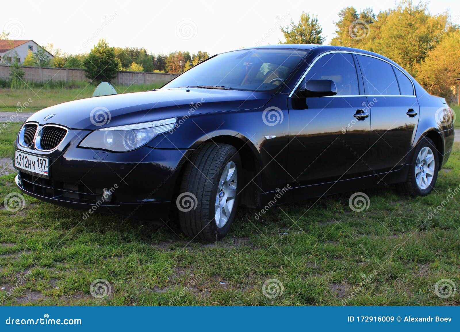 Dark Blue BMW 5 Series E60 on a Sunny Summer Day in a Clearing with Green  Grass Editorial Stock Image - Image of bavarian, speed: 172916009