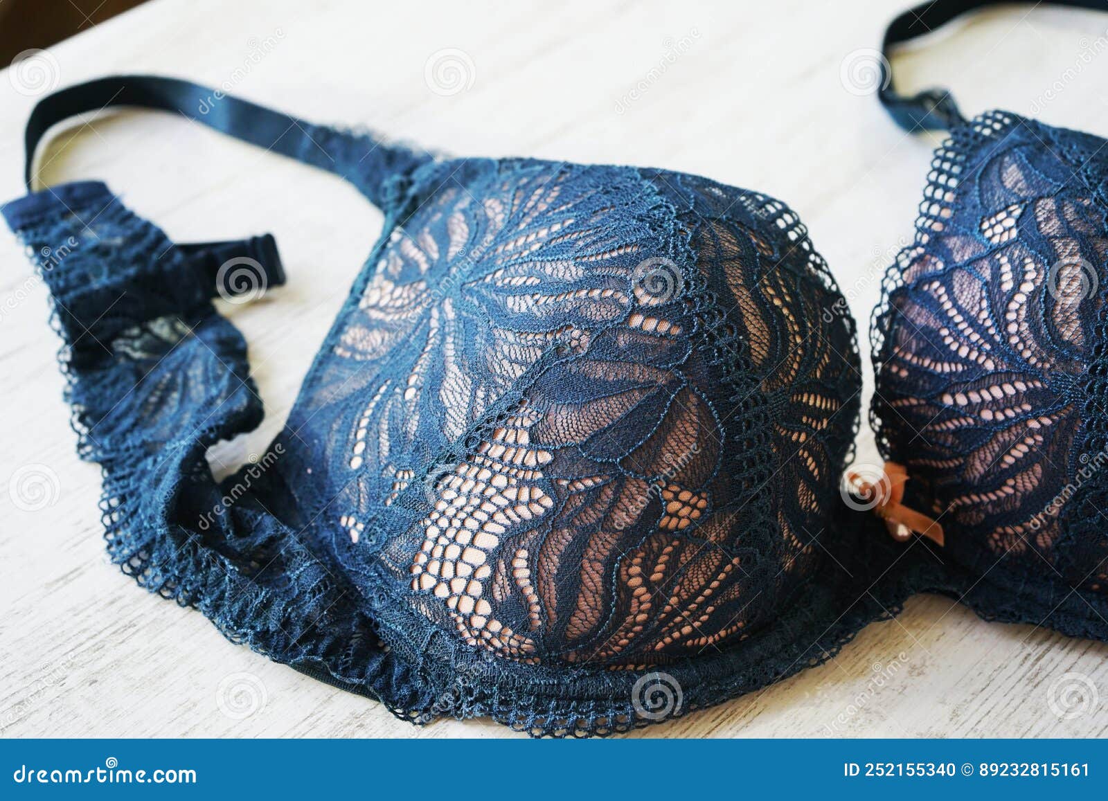 Dark Blue Female Bra with Push Up. One Lace Bra Close Up. Brassiere on a  White Beige Background. Women`s Underwear Stock Photo - Image of concept,  lace: 252155340