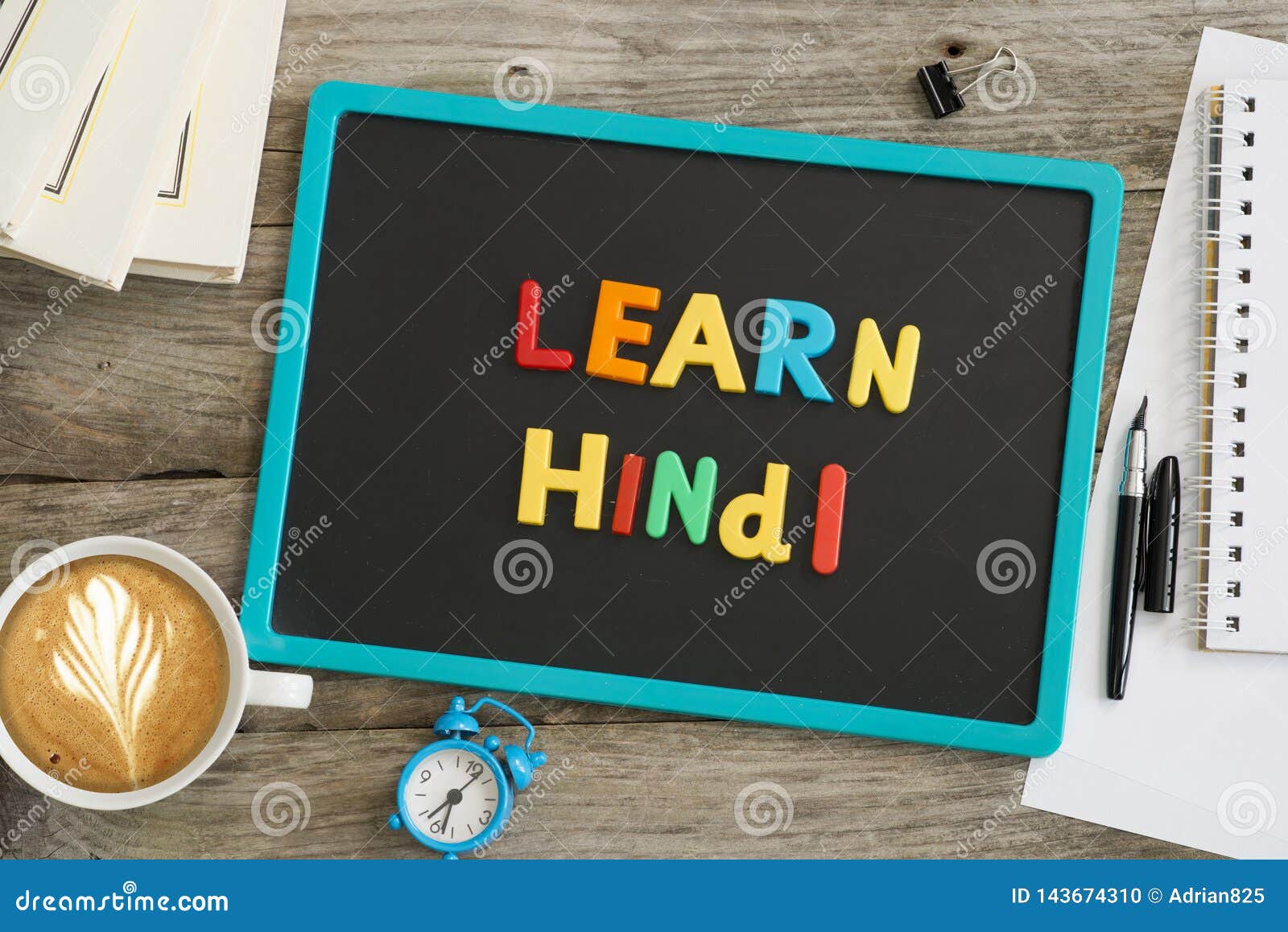 Dark Chalkboard with Learn Hindi Message from Colourful Plastic Letters