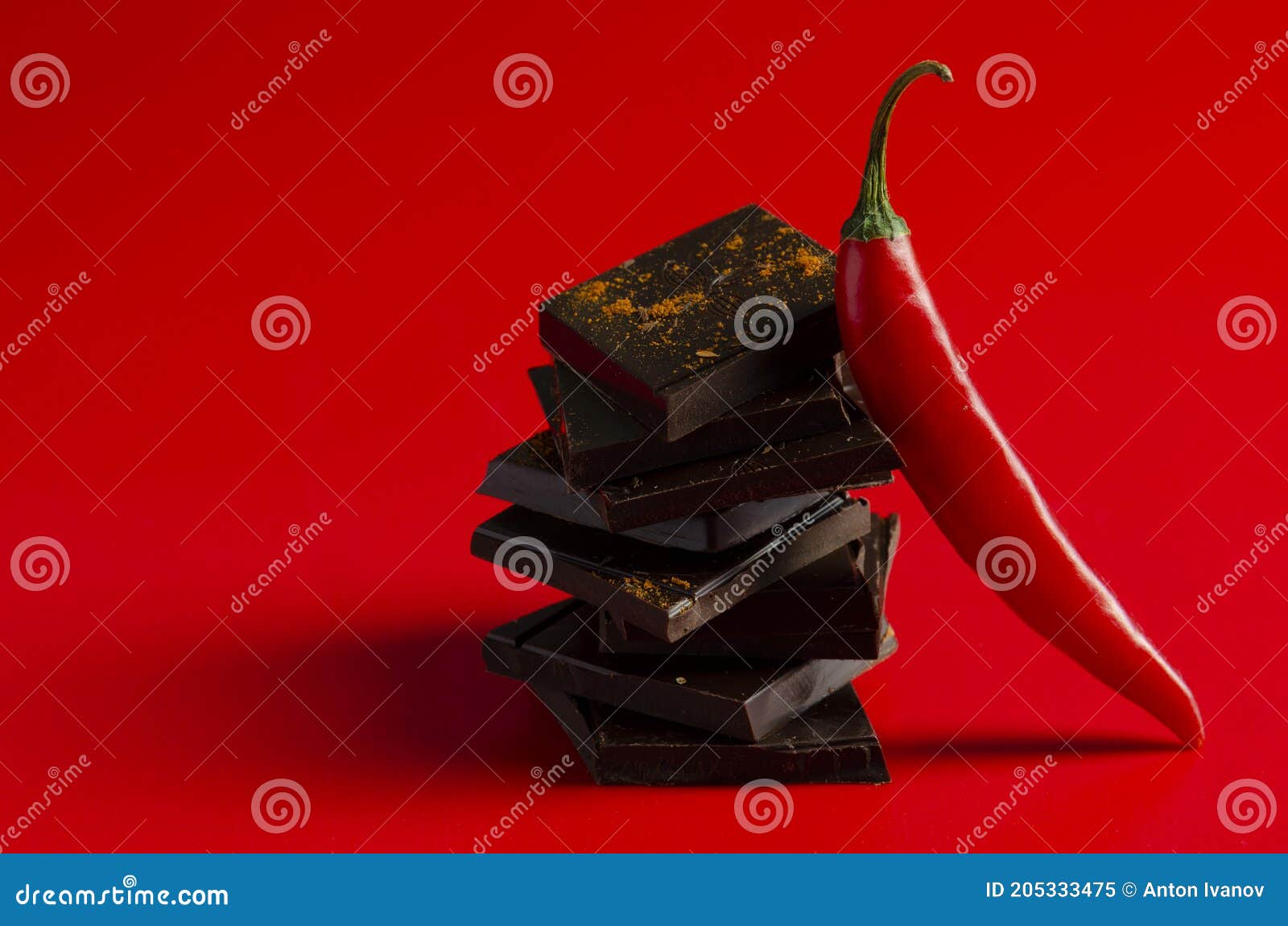 Dark Chocolate with Chili Pepper on Red Background Stock Image Image