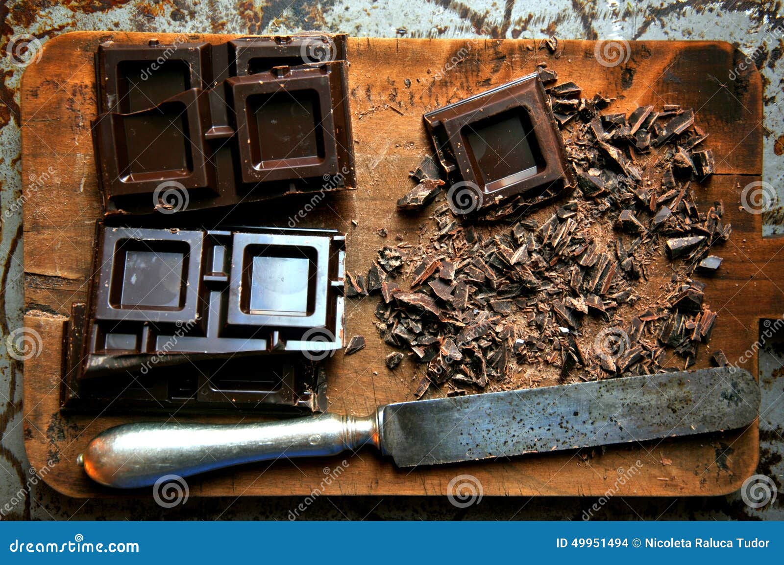 dark chocolate chopped on a wooden board