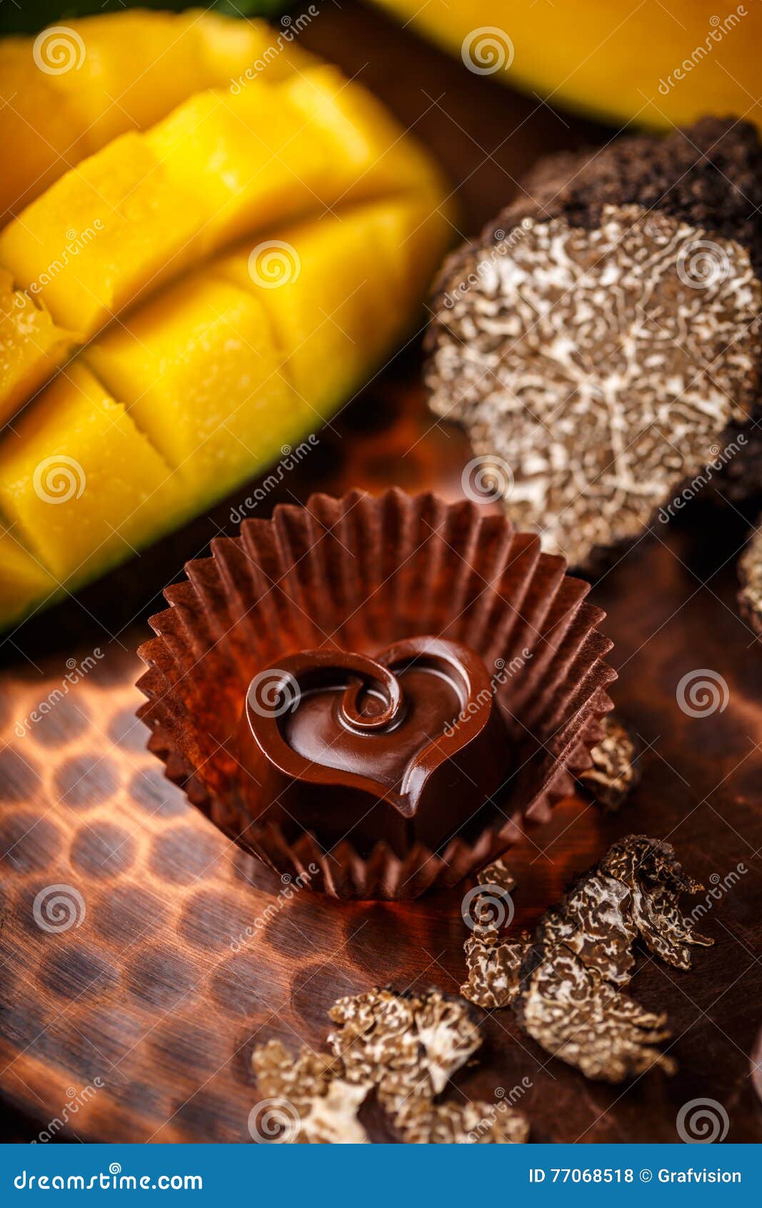 Dark chocolate praline stock photo. Image of truffle 77068518