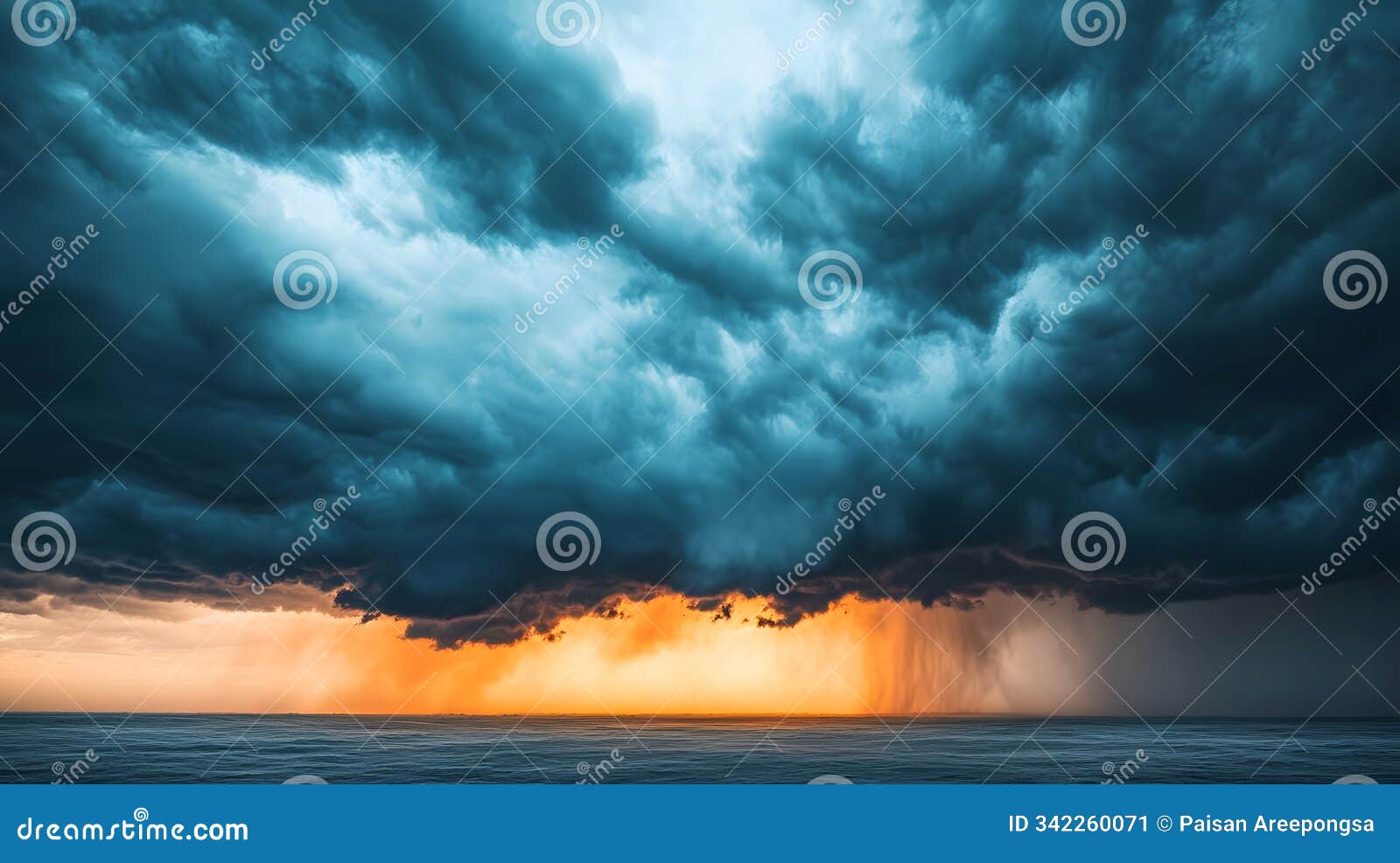 dark clouds loom over ocean as storm approaches, creating a beautiful contrast with distant light