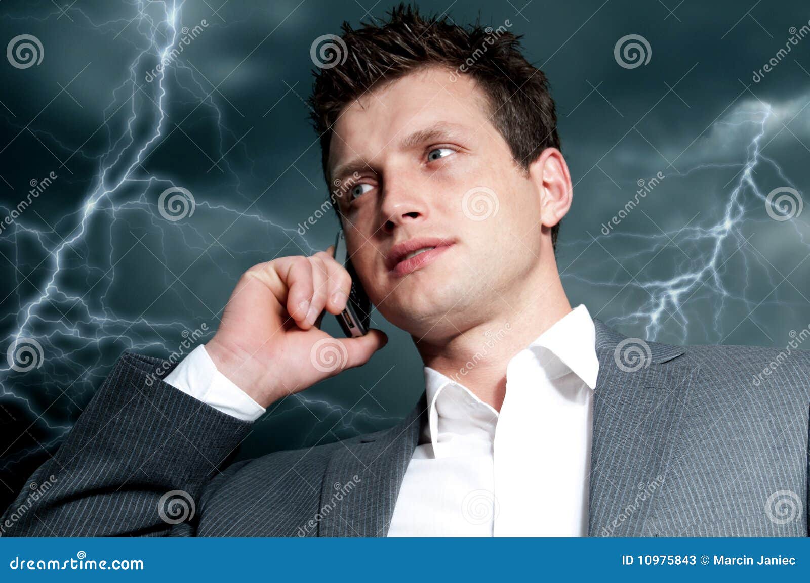 dark clouds over businessman