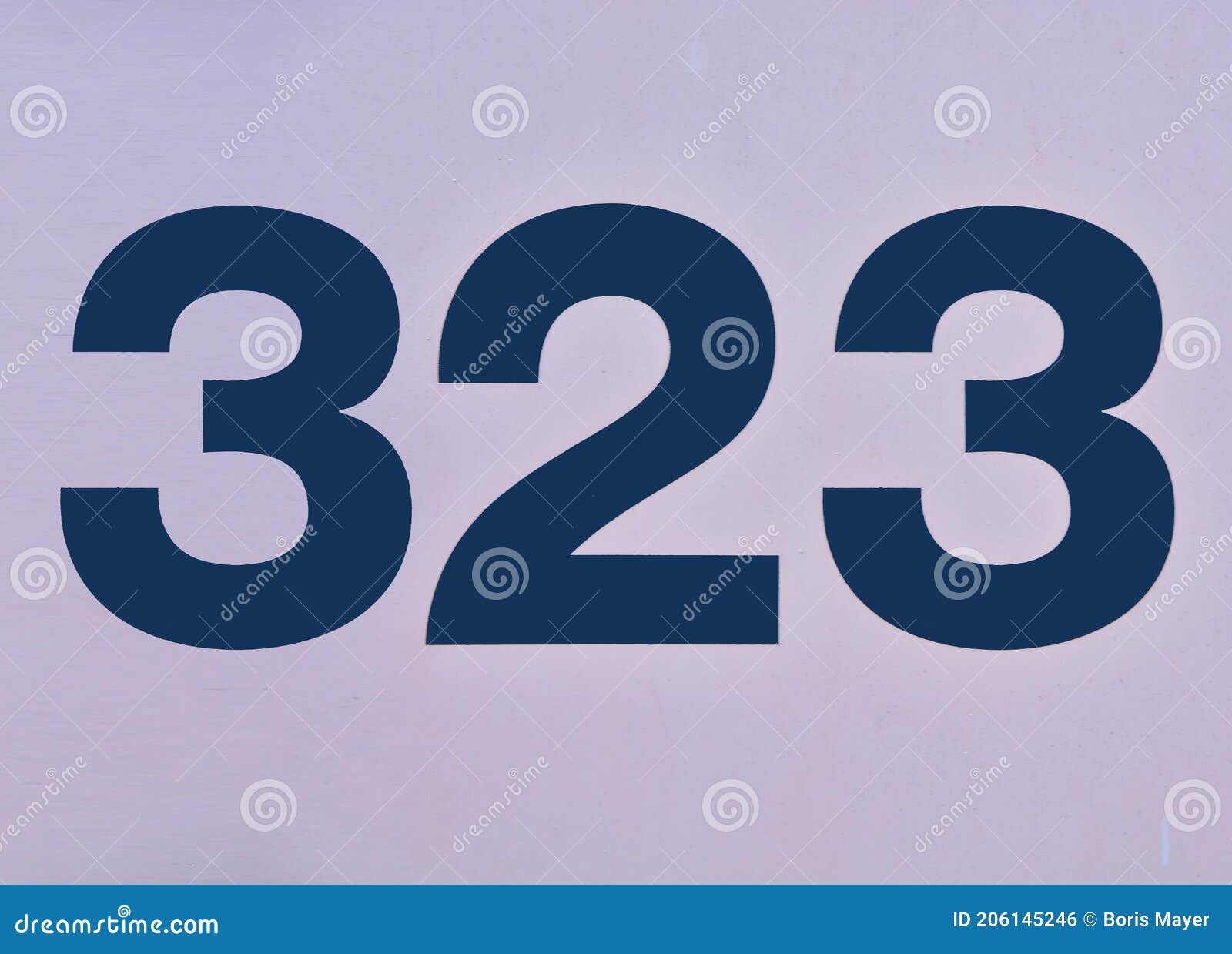 dark coloured digits on grey ground, showing the number three hundred and twenty three