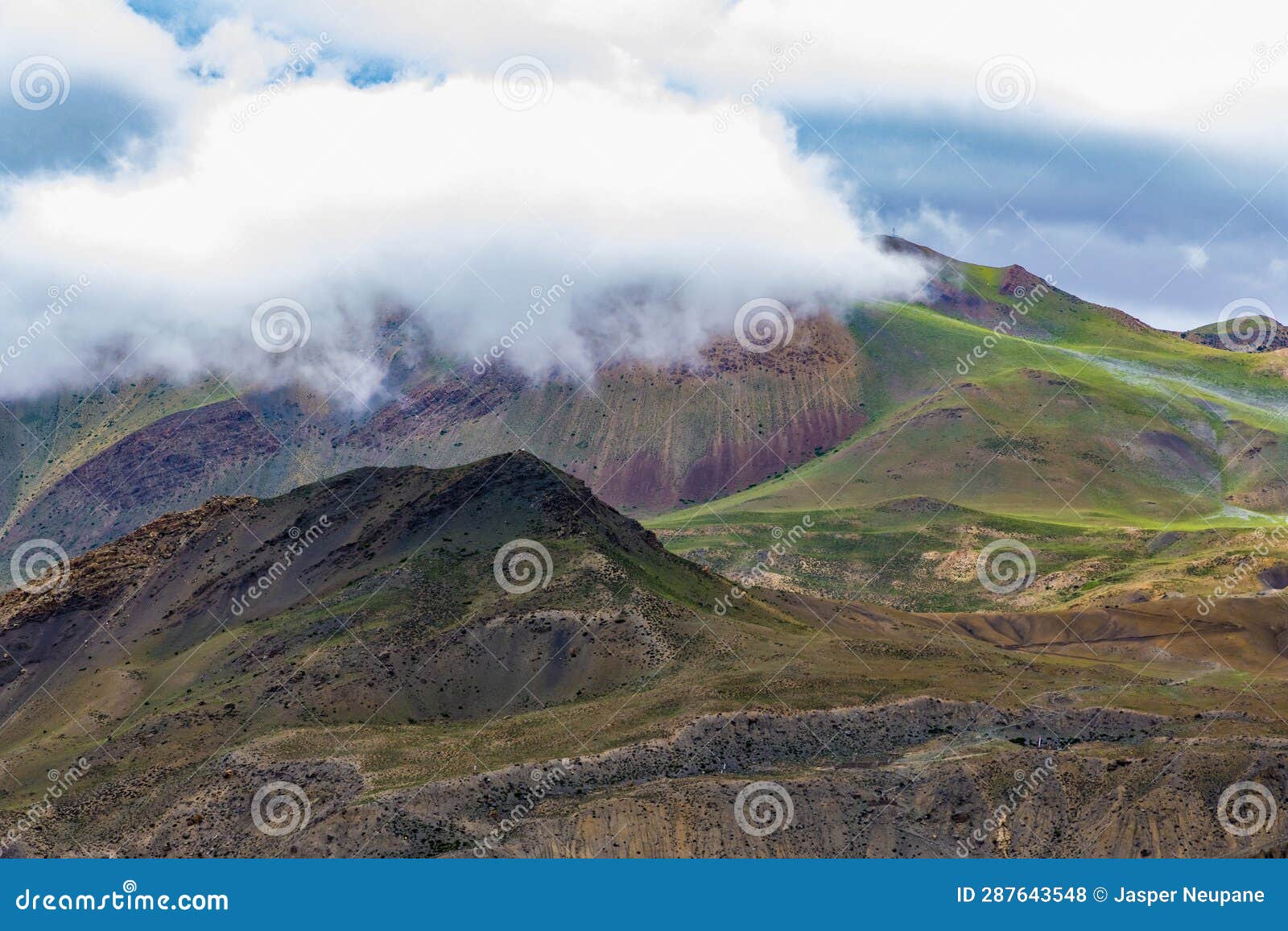 Dark Dramatic Desert Landscape with Foggy Mountains and Distant Houses ...