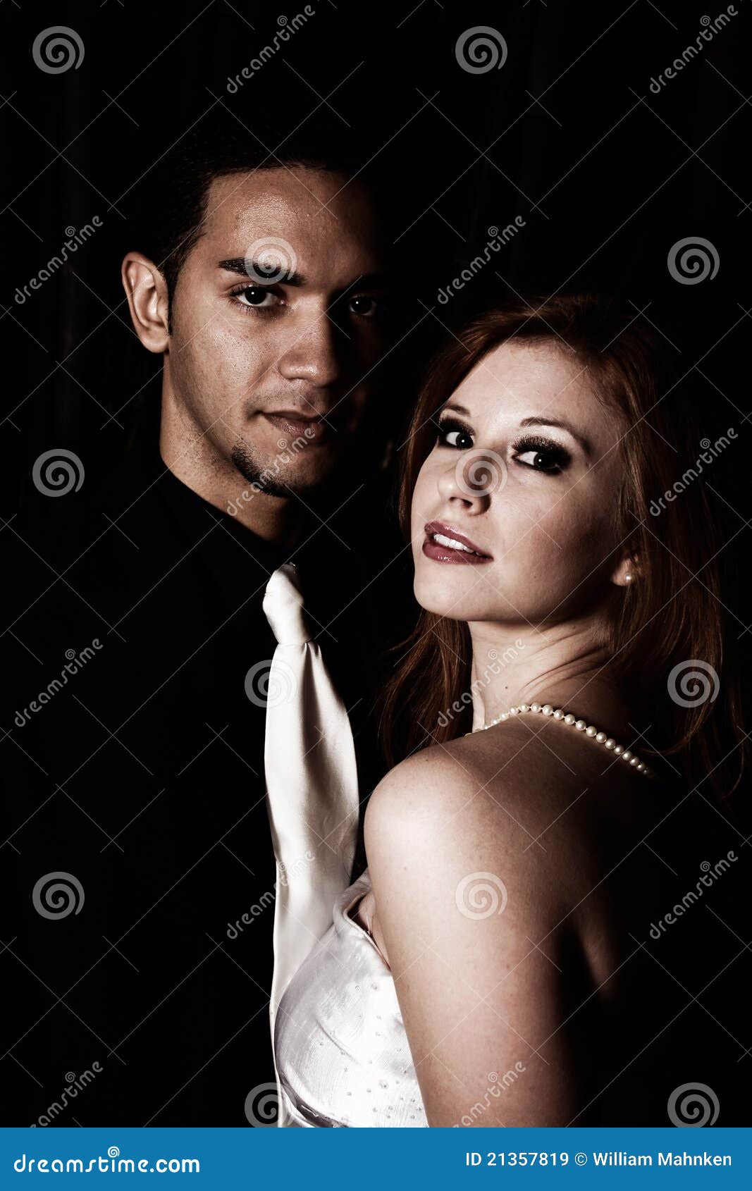 dark filtered photo of couple