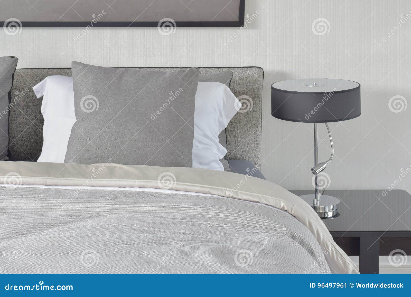 Dark Gray Pillow with Comfy Bed and Black Shade Reading Lamp Stock