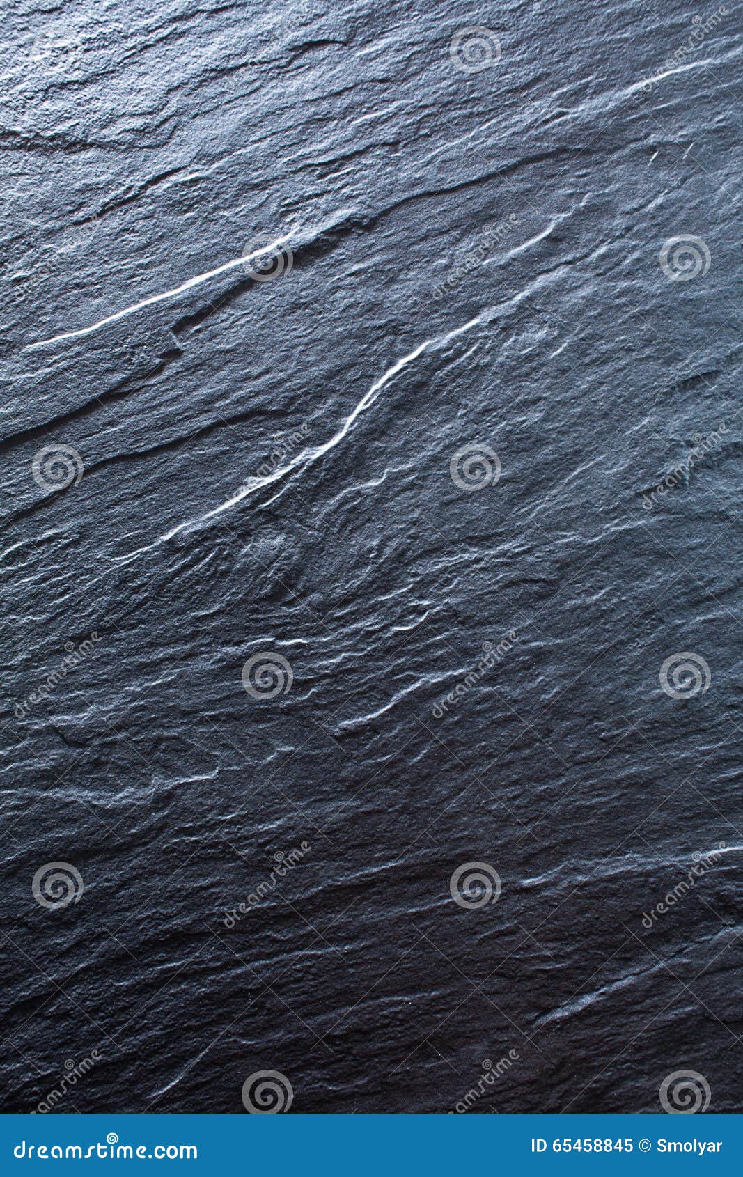 dark grey, black stone background. rock texture. black slate vertical background