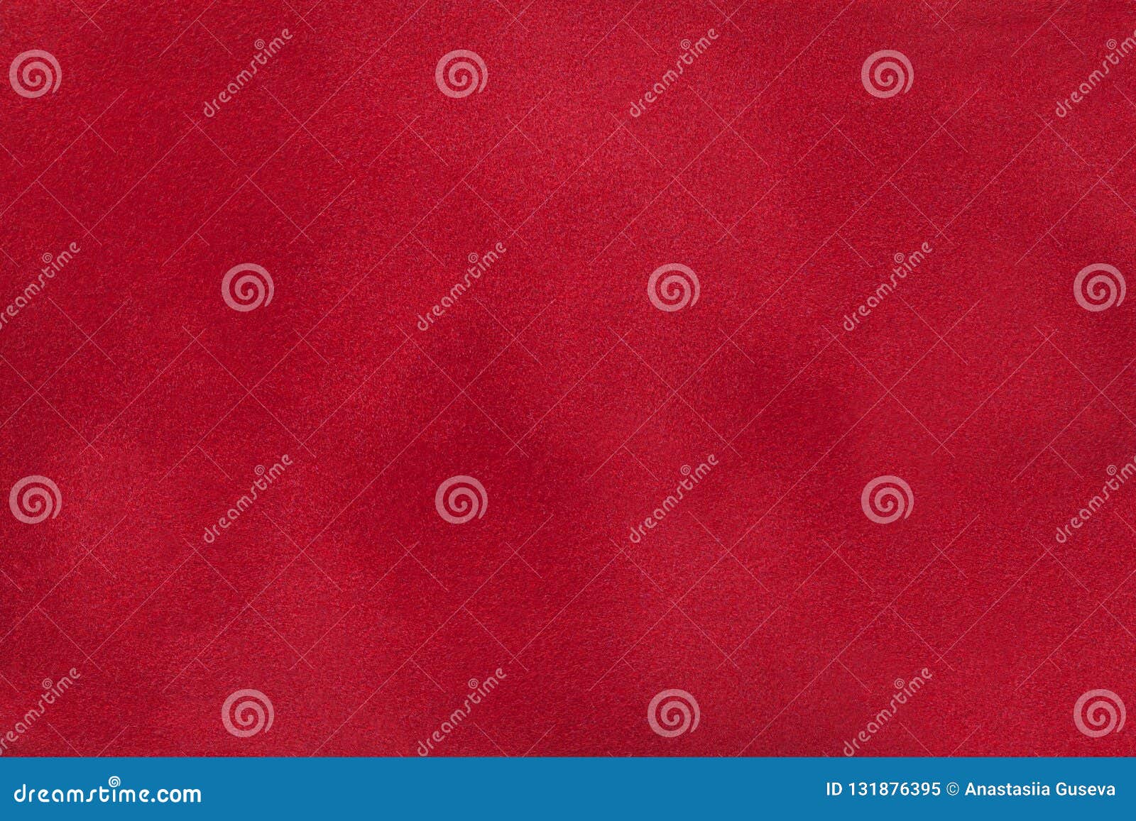 dark red matte background of suede fabric, closeup