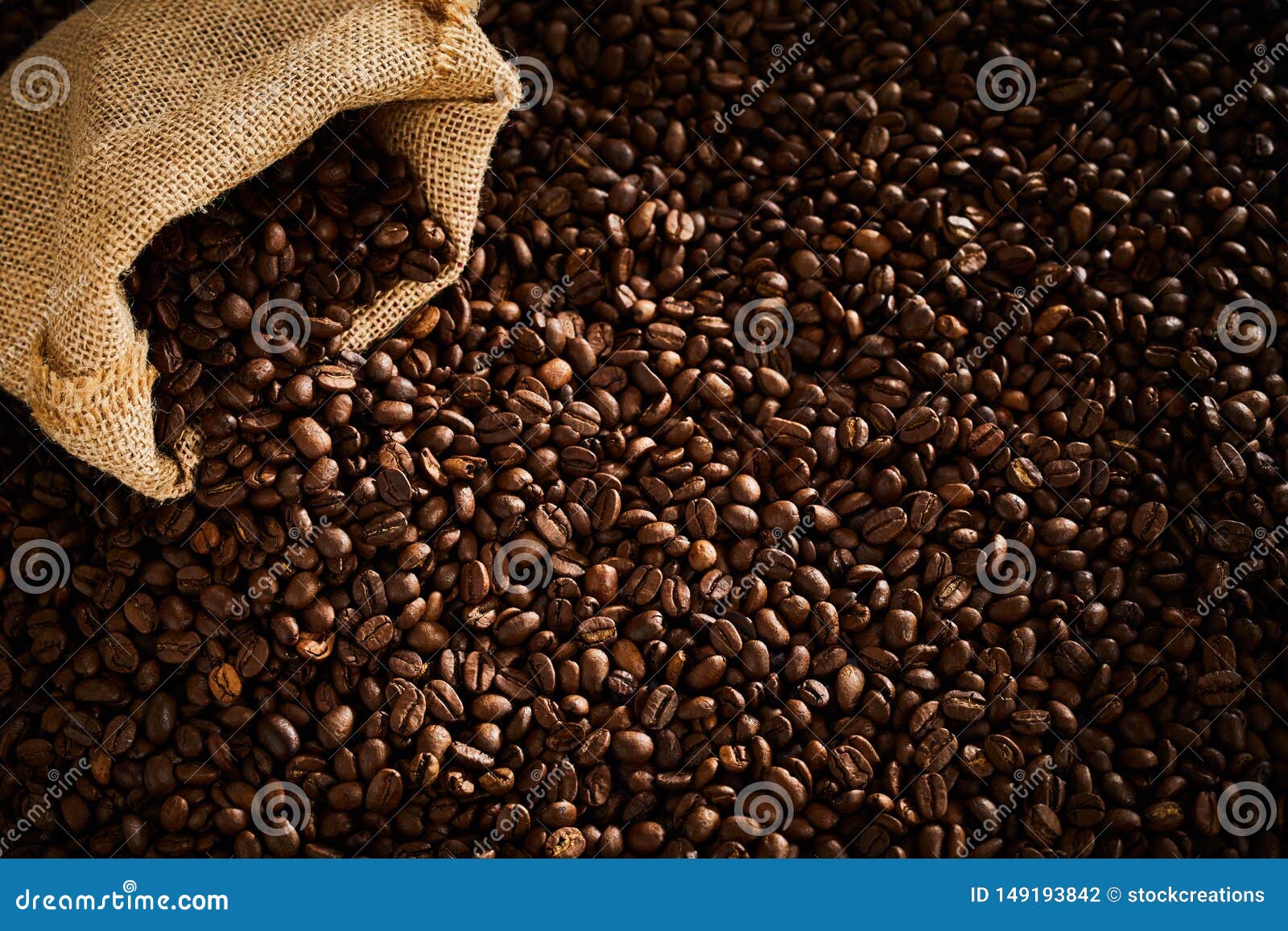 Dark Roasted Coffee Beans Spilling from a Sack Stock Photo Image of