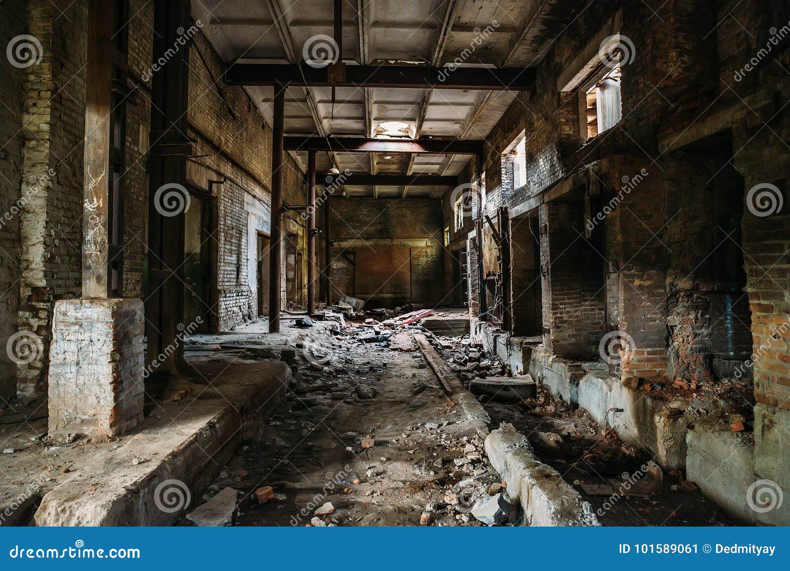 dark scary corridor in abandoned industrial ruined brick factory, creepy interior, perspective