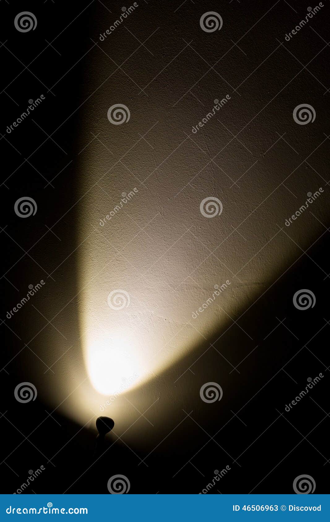 Dark Wall Illuminated from the Left Corner Spotlight Lamp Stock Image