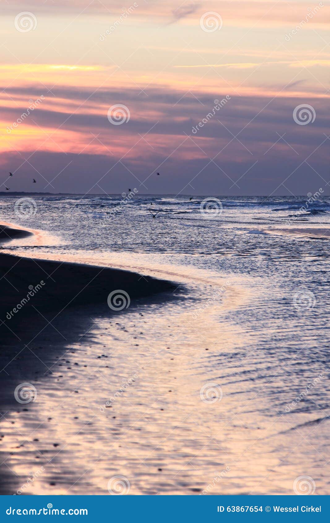 darkness falls over north sea, ameland, holland