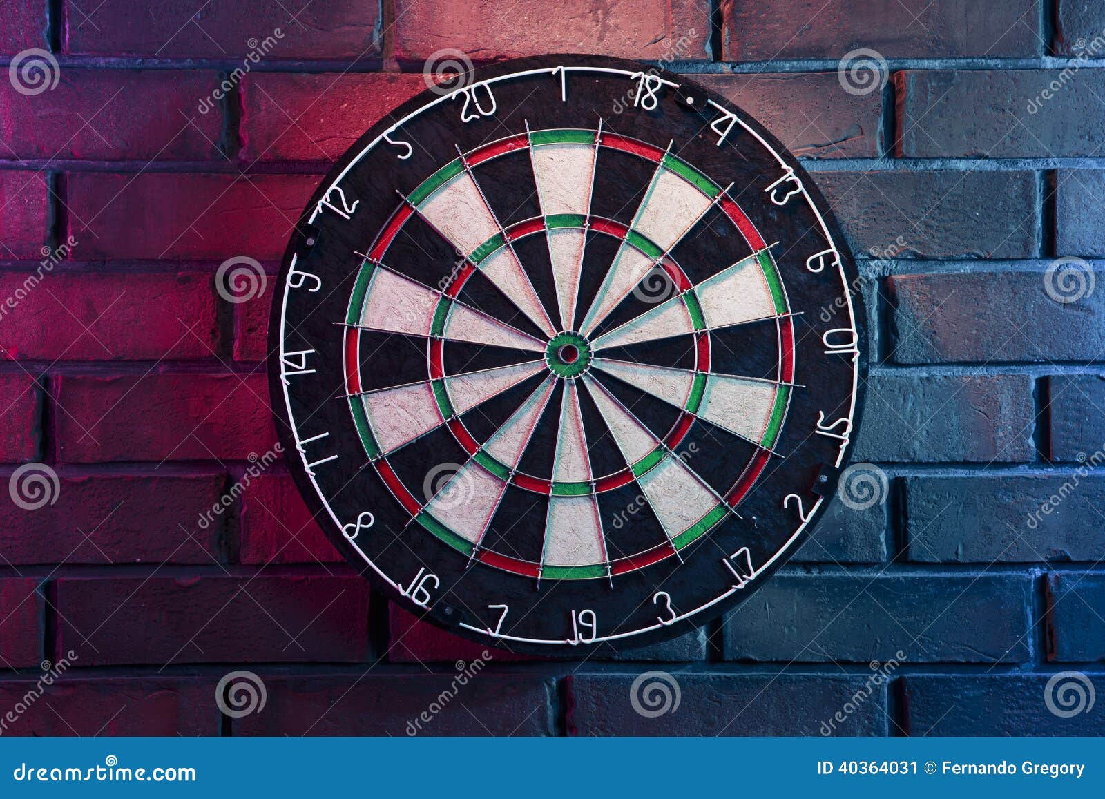 Dart Board on a Brick Wall with Dramatic Lighting Stock Image Image
