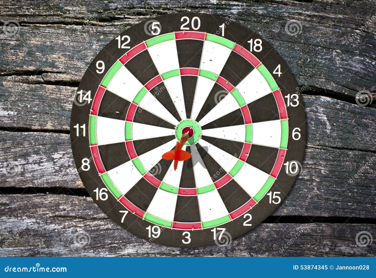 Dartboard on wood wall stock image. Image of grunge, dart 53874345