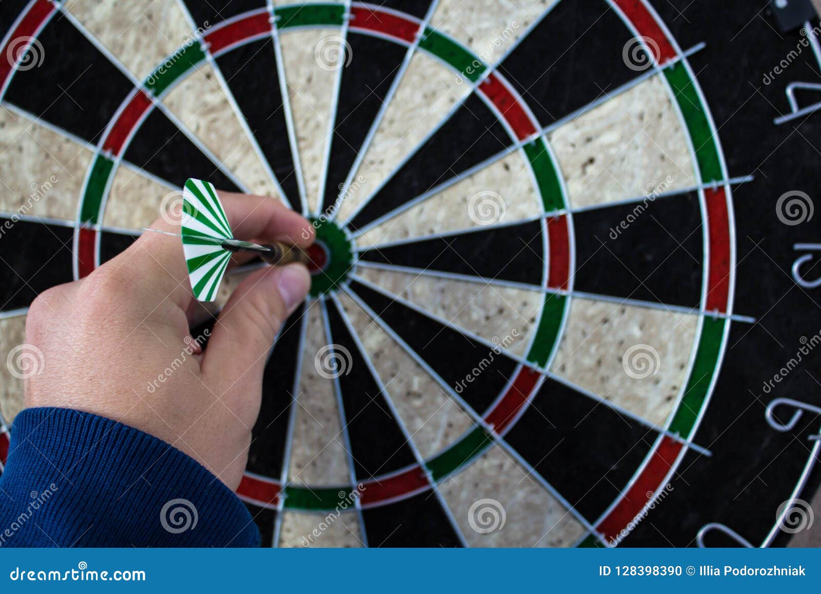 A Darts on the Wall with Dart Hit the Mark Stock Photo Image of game