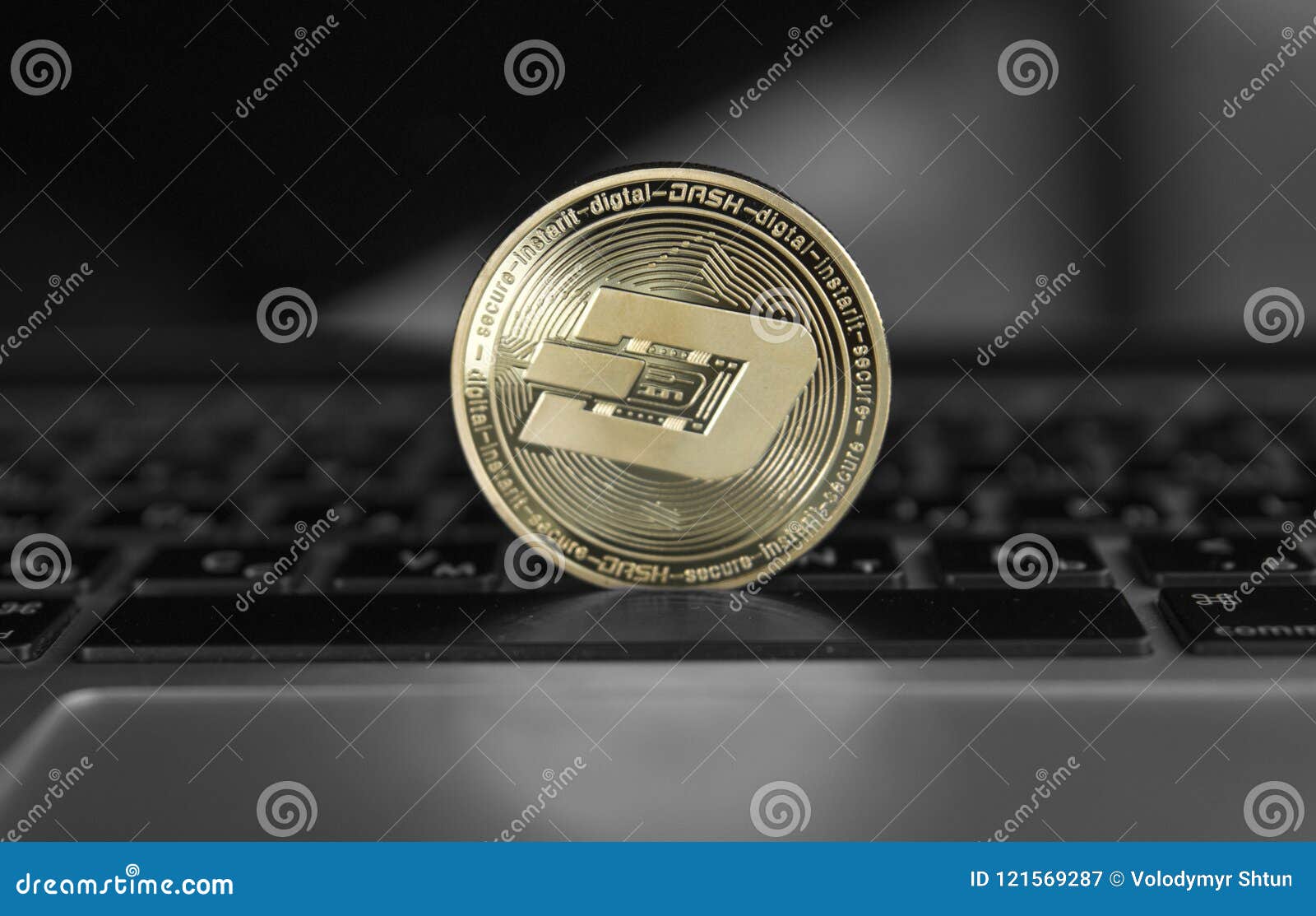 dash coin  on laptop. concept financial currency, crypto currency sign. blockchain mining. digital money and