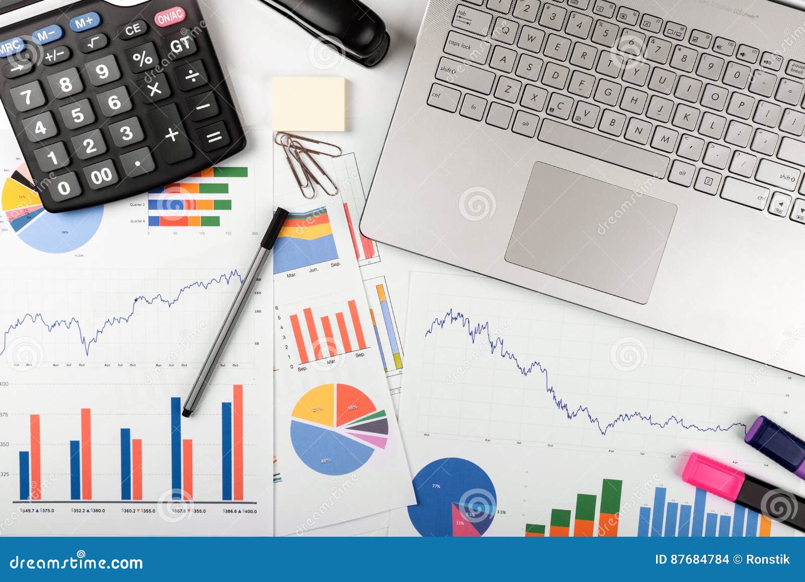 data analysis - workplace with business graphs and charts