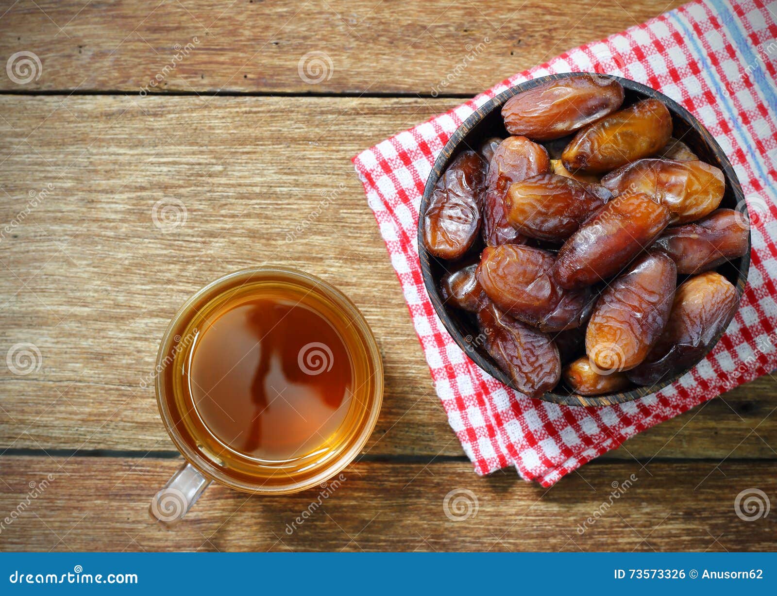 Datepalm in Wood Bowl with Cup of Tea on Wood Stock Photo Image of