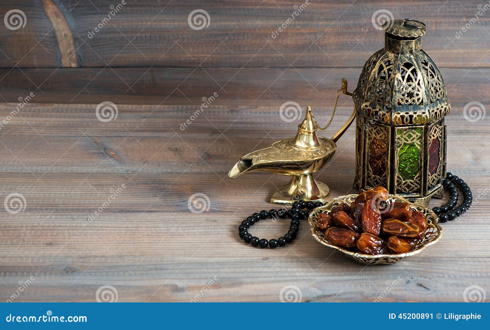 dates, arabian lantern and rosary. islamic holiday