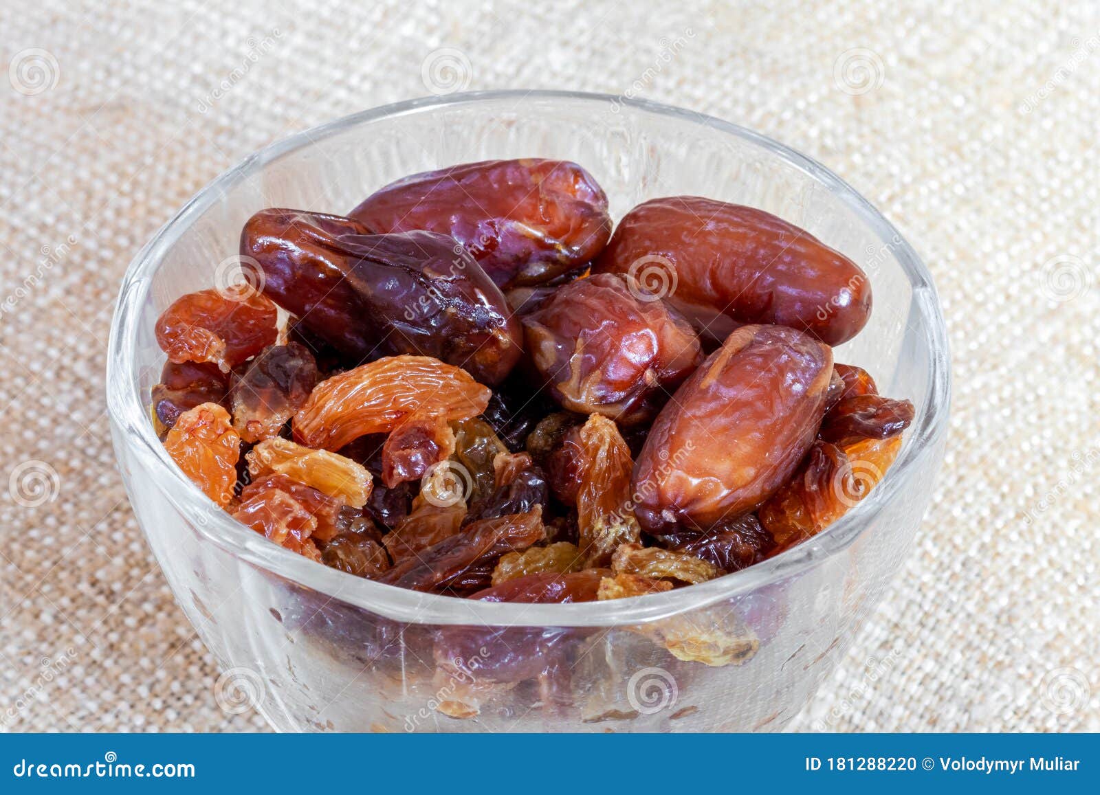 Dates and Raisins in a Transparent Plate on Burlap Stock Photo Image